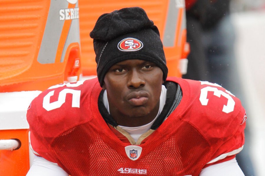 In this Oct. 17, 2010 file photo, San Francisco 49ers cornerback Phillip Adams (35) sits on the sideline during the first quarter of an NFL football game in San Francisco. (AP Photo/Paul Sakuma, File)