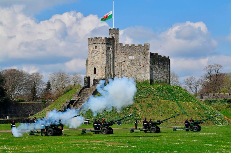 Members of the 104th Regiment Royal Artillery fire a 41-round gun salute in the grounds of Cardiff Castle, to mark the death of Prince Philip, in Cardiff, Saturday, April 10, 2021. (Ben Birchall/PA via AP)