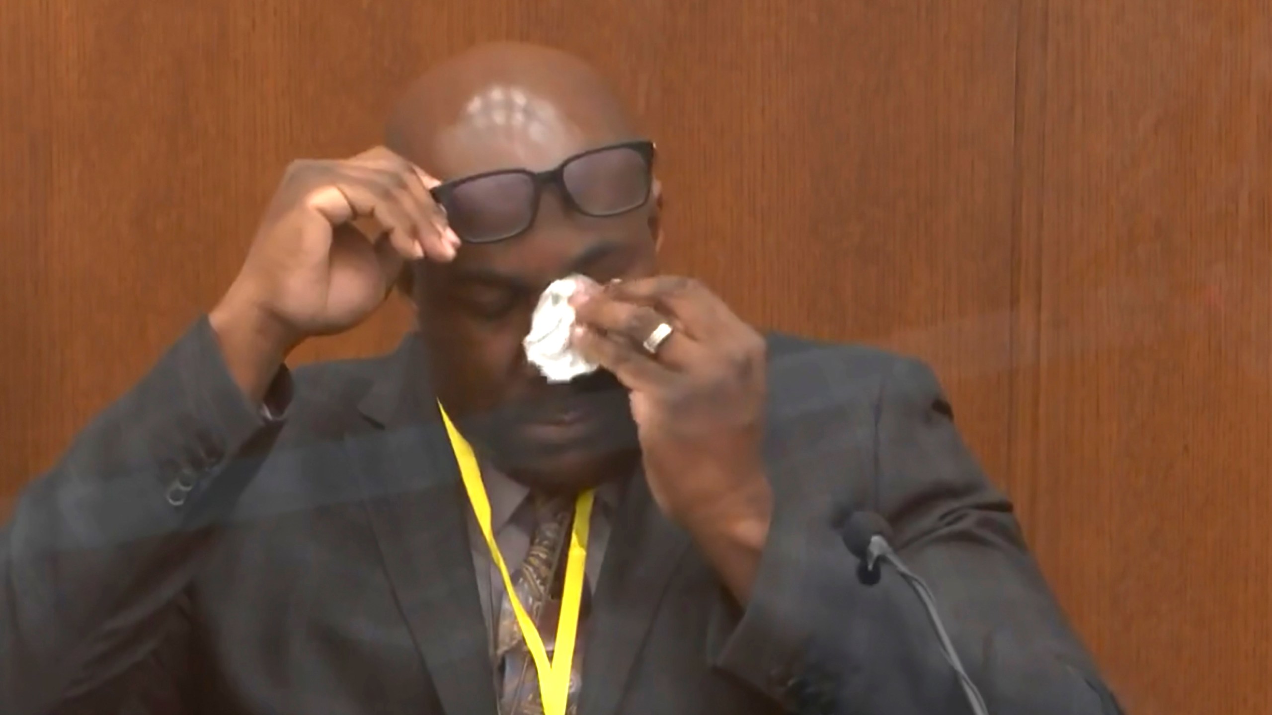 In this image from video, Philonise Floyd, brother of George Floyd, becomes emotional as he testifies as Hennepin County Judge Peter Cahill presides over court Monday, April 12, 2021, in the trial of former Minneapolis police Officer Derek Chauvin, in the May 25, 2020, death of George Floyd at the Hennepin County Courthouse in Minneapolis, Minn. (Court TV via AP, Pool)