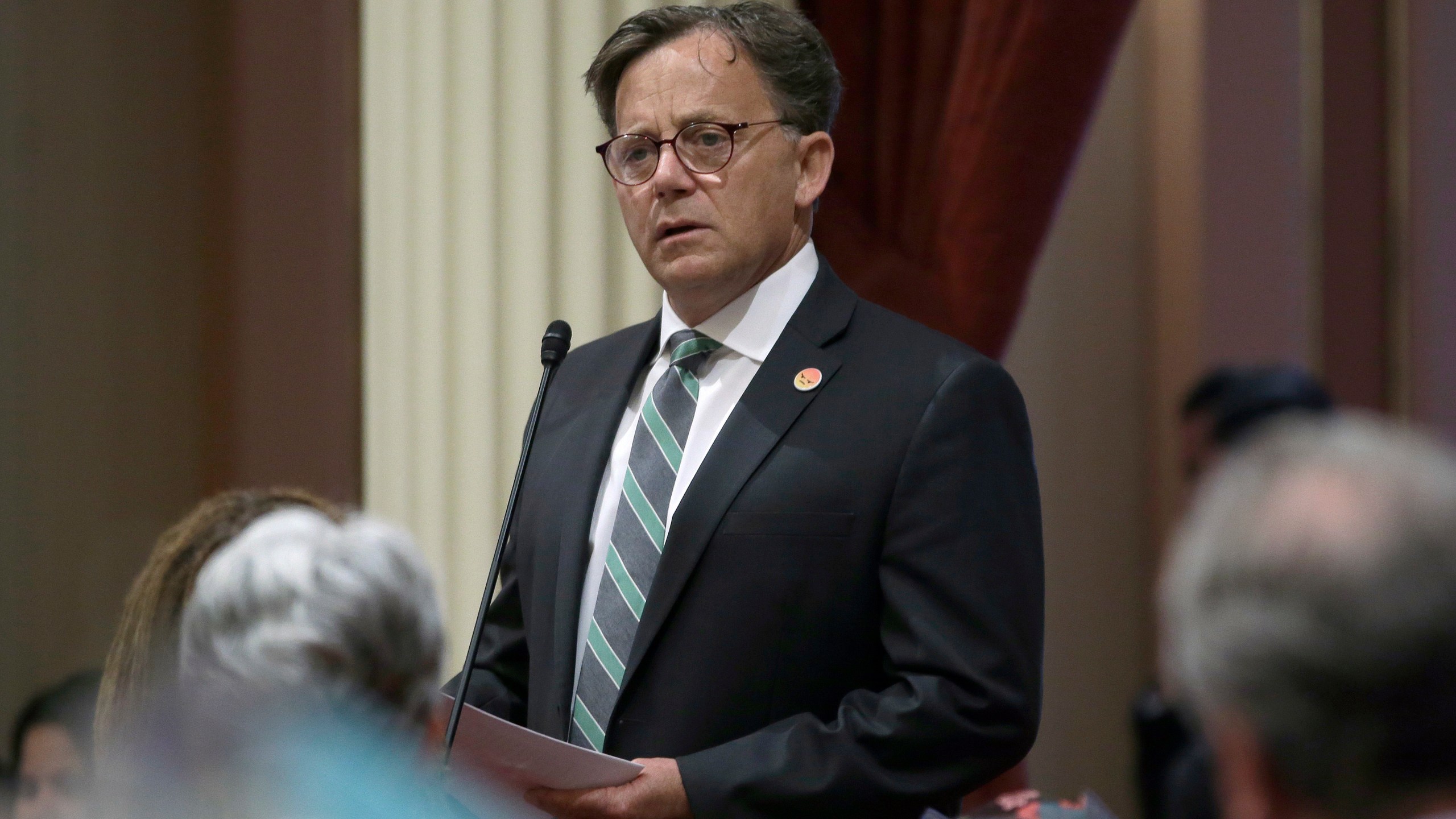 In this June 11, 2018, file photo, state Sen. Josh Newman, D-Fullerton, discusses the recall election against him, during a Senate session in Sacramento, Calif. Newman was recalled in 2018 before winning re-election in 2020. He presented new legislation on Monday, April 12, 2021, that would allow politicians facing recalls to see who signs the petitions against them. (AP Photo/Rich Pedroncelli, File)