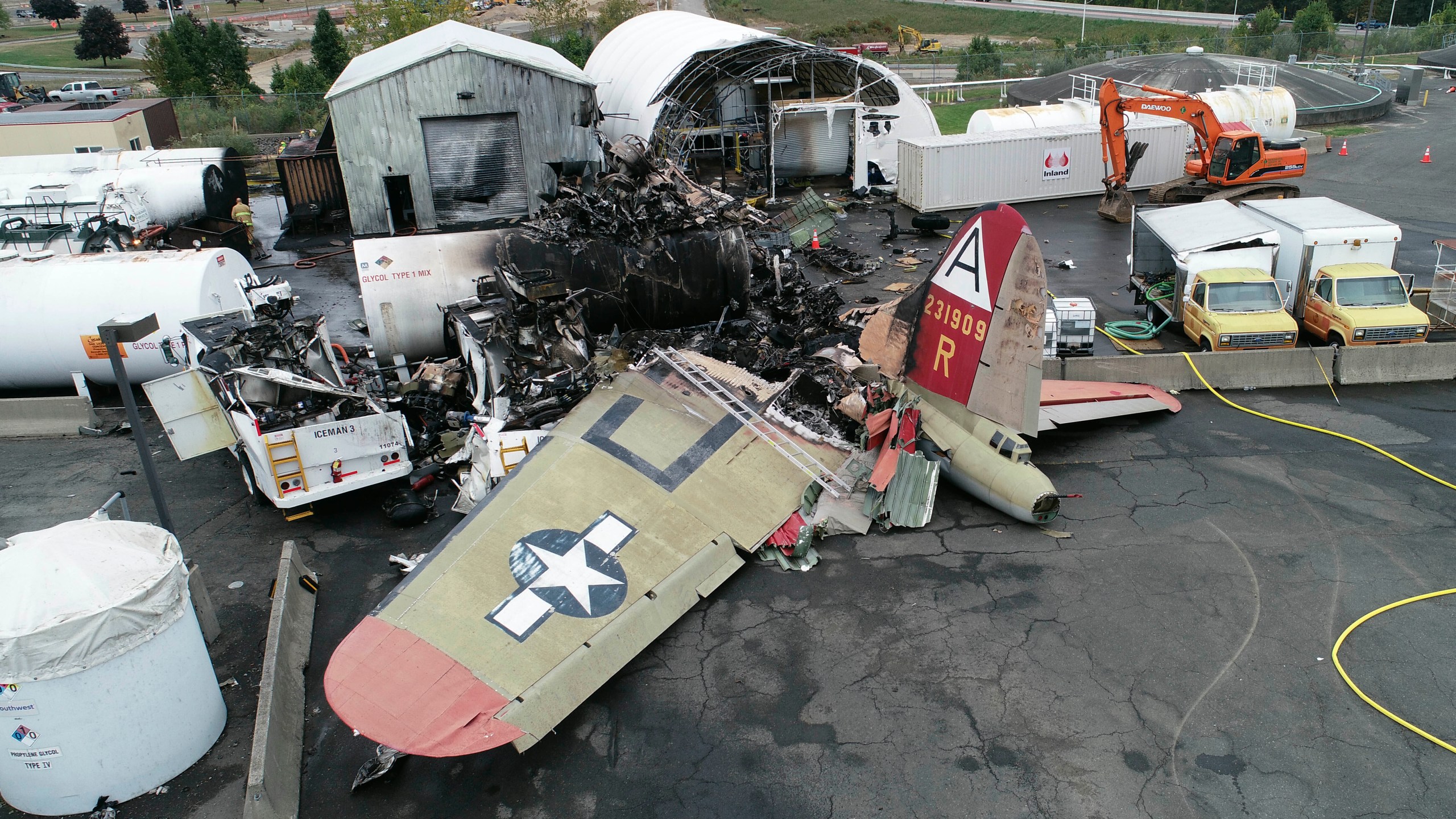 This photo, provided by the National Transportation Safety Board, shows damage from a World War II-era B-17 bomber plane that crashed on Oct. 2, 2019, at Bradley International Airport in Windsor Locks, Conn. Pilot error was the probable cause of the 2019 crash that killed seven people and wounded six others, the National Transportation Safety Board said in a report released Tuesday, April 13, 2021, that also cited inadequate maintenance as a contributing factor. (NTSB via AP, File)