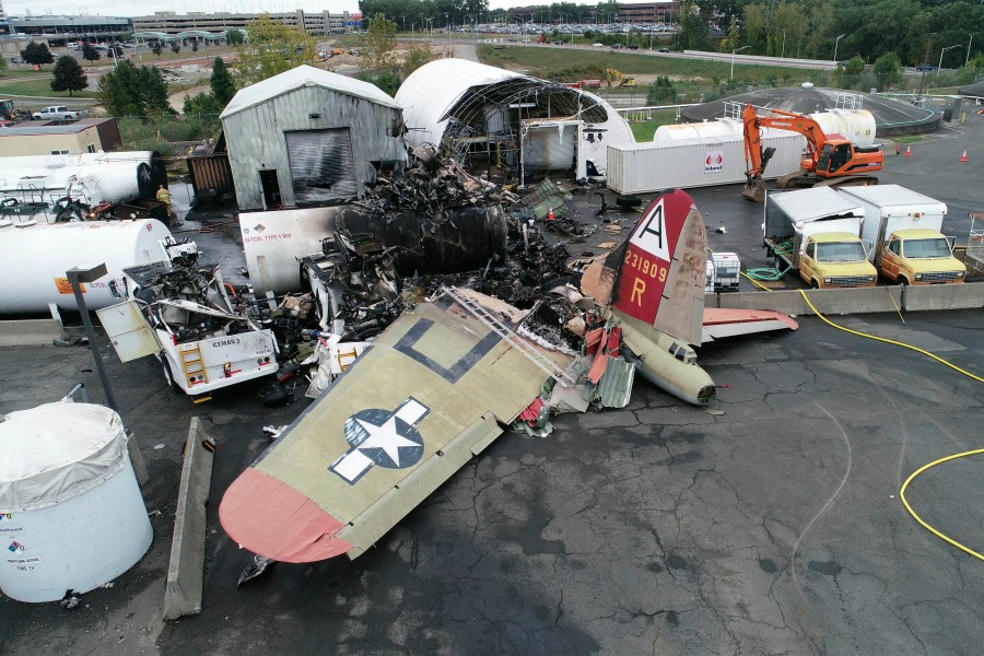 This photo, provided by the National Transportation Safety Board, shows damage from a World War II-era B-17 bomber plane that crashed on Oct. 2, 2019, at Bradley International Airport in Windsor Locks, Conn. Pilot error was the probable cause of the 2019 crash that killed seven people and wounded six others, the National Transportation Safety Board said in a report released Tuesday, April 13, 2021, that also cited inadequate maintenance as a contributing factor. (NTSB via AP, File)