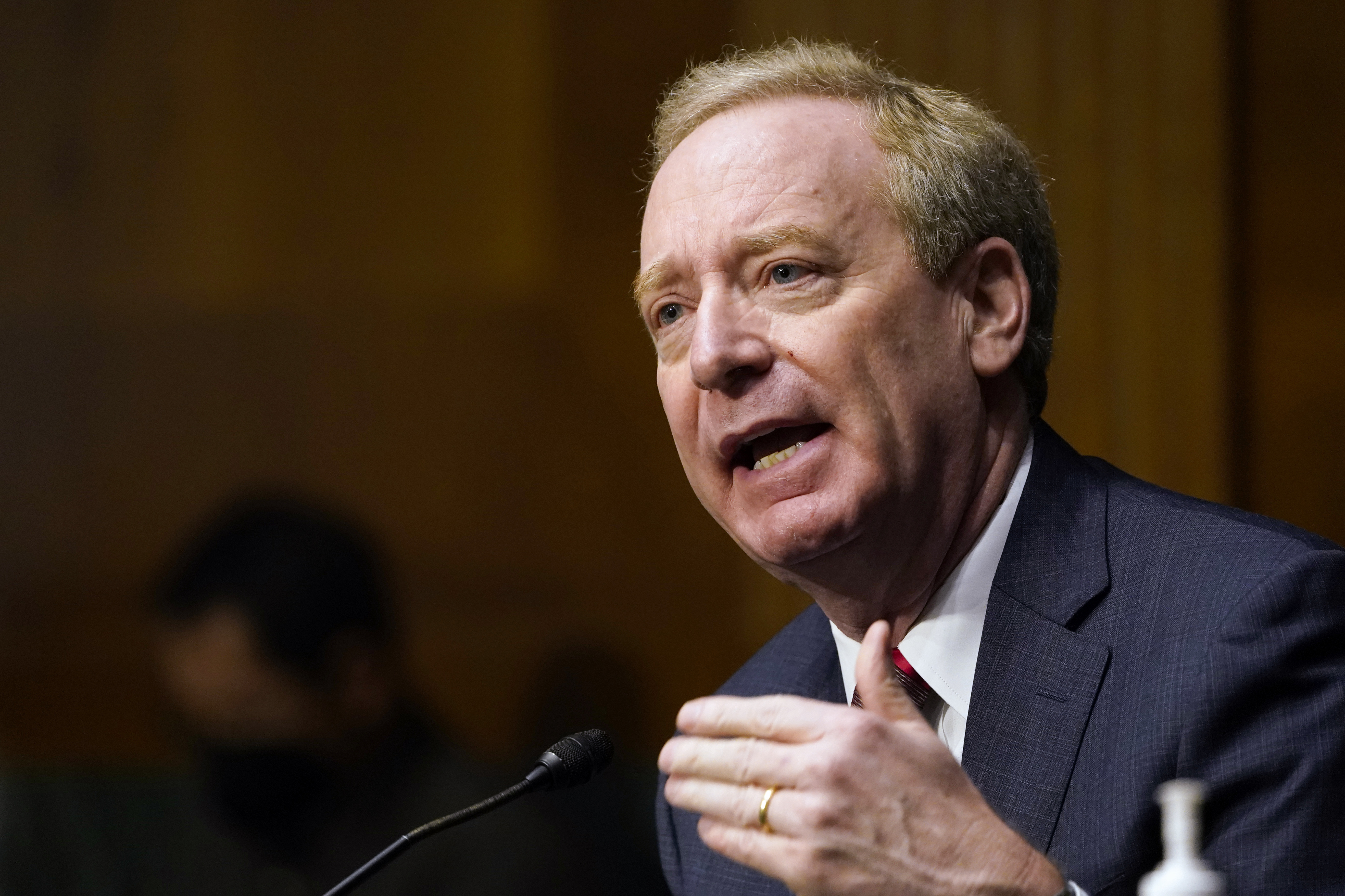 In this Feb. 23, 2021, file photo Brad Smith, president of Microsoft Corporation, speaks on Capitol Hill in Washington during a hearing on emerging technologies and their impact on national security. (AP Photo/Susan Walsh, File)