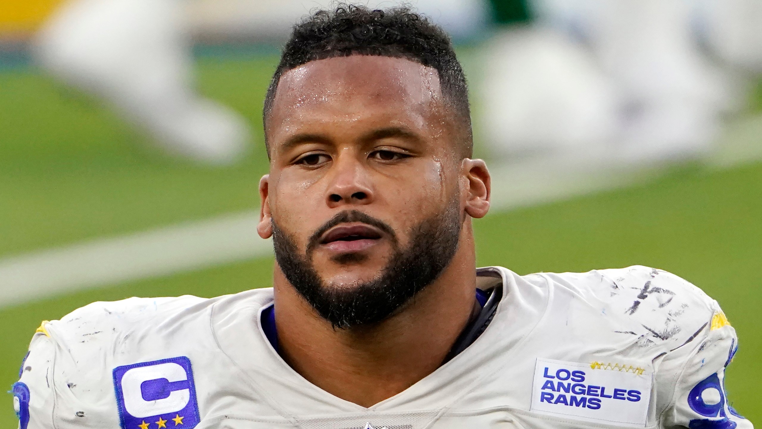 Los Angeles Rams defensive end Aaron Donald (99) walks off the field after a loss to the New York Jets in an NFL football game in Inglewood, in this Sunday, Dec. 20, 2020, file photo. (AP Photo/Jae C. Hong, File)