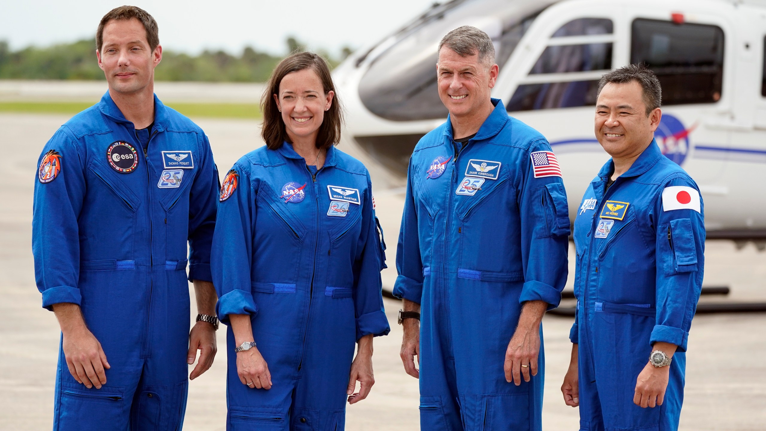 SpaceX Crew 2 members, from left, European Space Agency astronaut Thomas Pesquet, NASA astronauts Megan McArthur and Shane Kimbrough and Japan Aerospace Exploration Agency astronaut Akihiko Hoshide gather at the Kennedy Space Center in Cape Canaveral, Florida, Friday, April 16, 2021 to prepare for a mission to the International Space Station. The launch is targeted for April 22. (AP Photo/John Raoux)