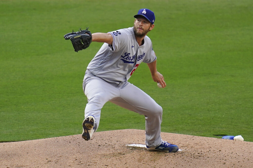 Los Angeles Dodgers starting pitcher Clayton Kershaw works against a San Diego Padres batter during the first inning of a baseball game Saturday, April 17, 2021, in San Diego. (AP Photo/Gregory Bull)