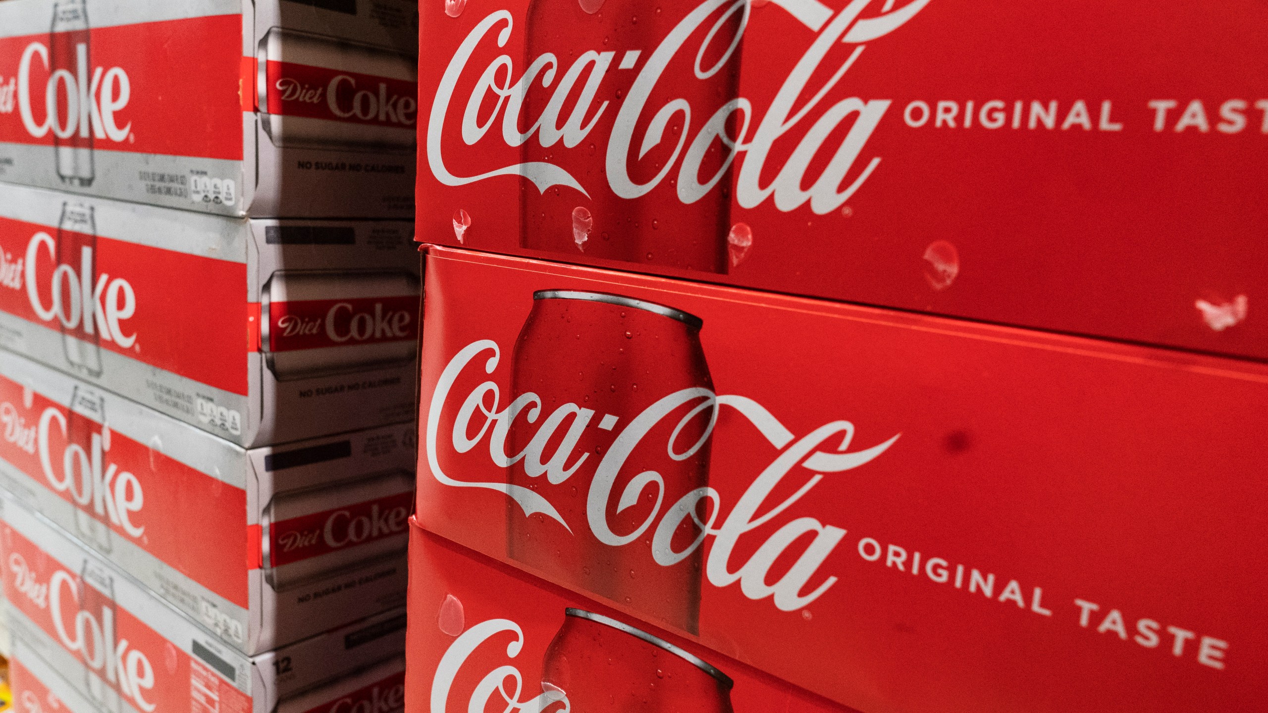 In this Monday, April 5, 2021 file photo, cases of Coca-Cola are displayed in a supermarket, in New York. Coca-Cola Co. (AP Photo/Mark Lennihan, File)