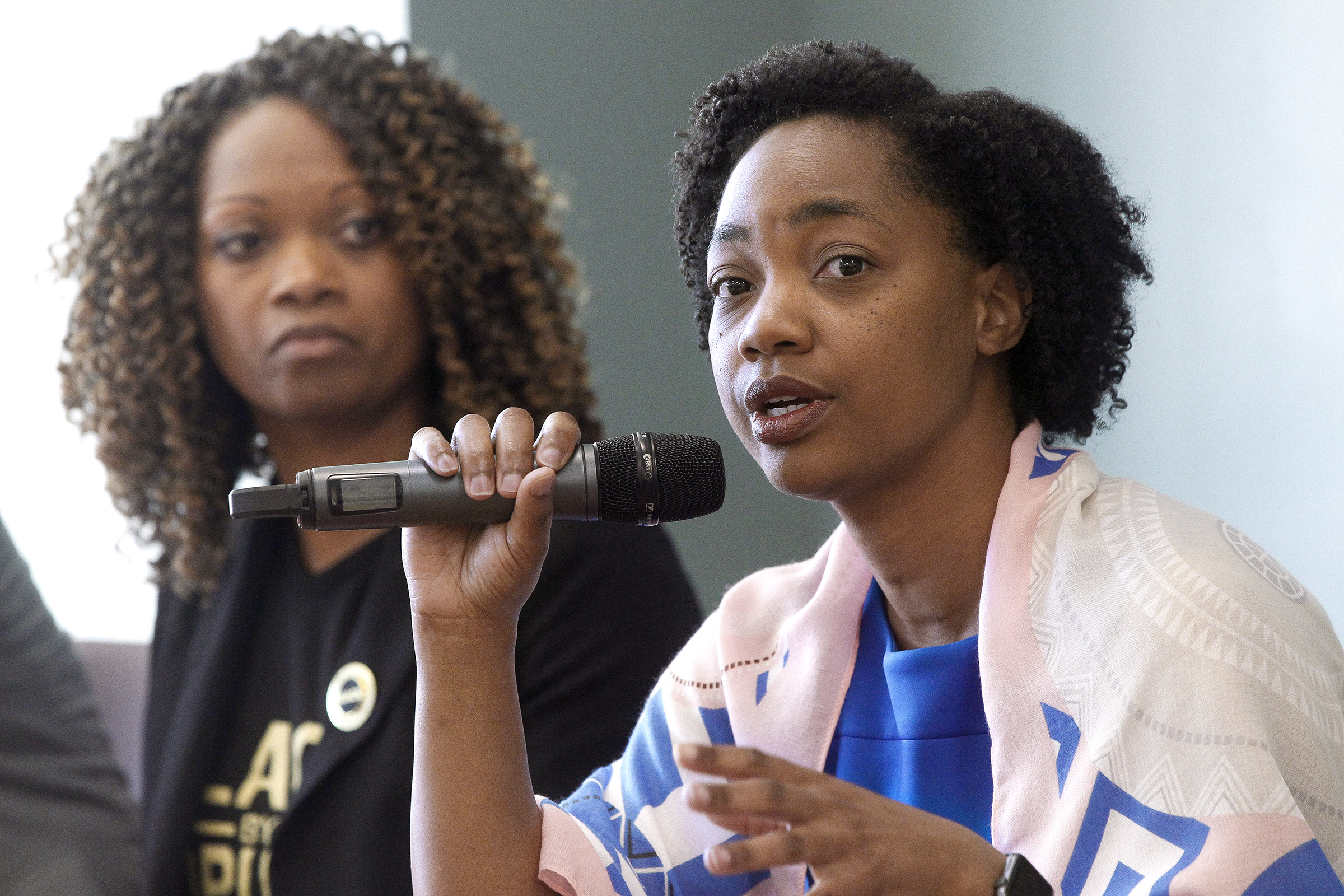 In this Feb. 23, 2019 file photo La Mesa City Council member Akilah Weber speaks as she sits with other members of the panel during the Black Excellence in Public Service: Serving and Protecting Our Children forum held at the Skyline Hills Branch Library in San Diego. (Hayne Palmour IV/The San Diego Union-Tribune via Associated Press)