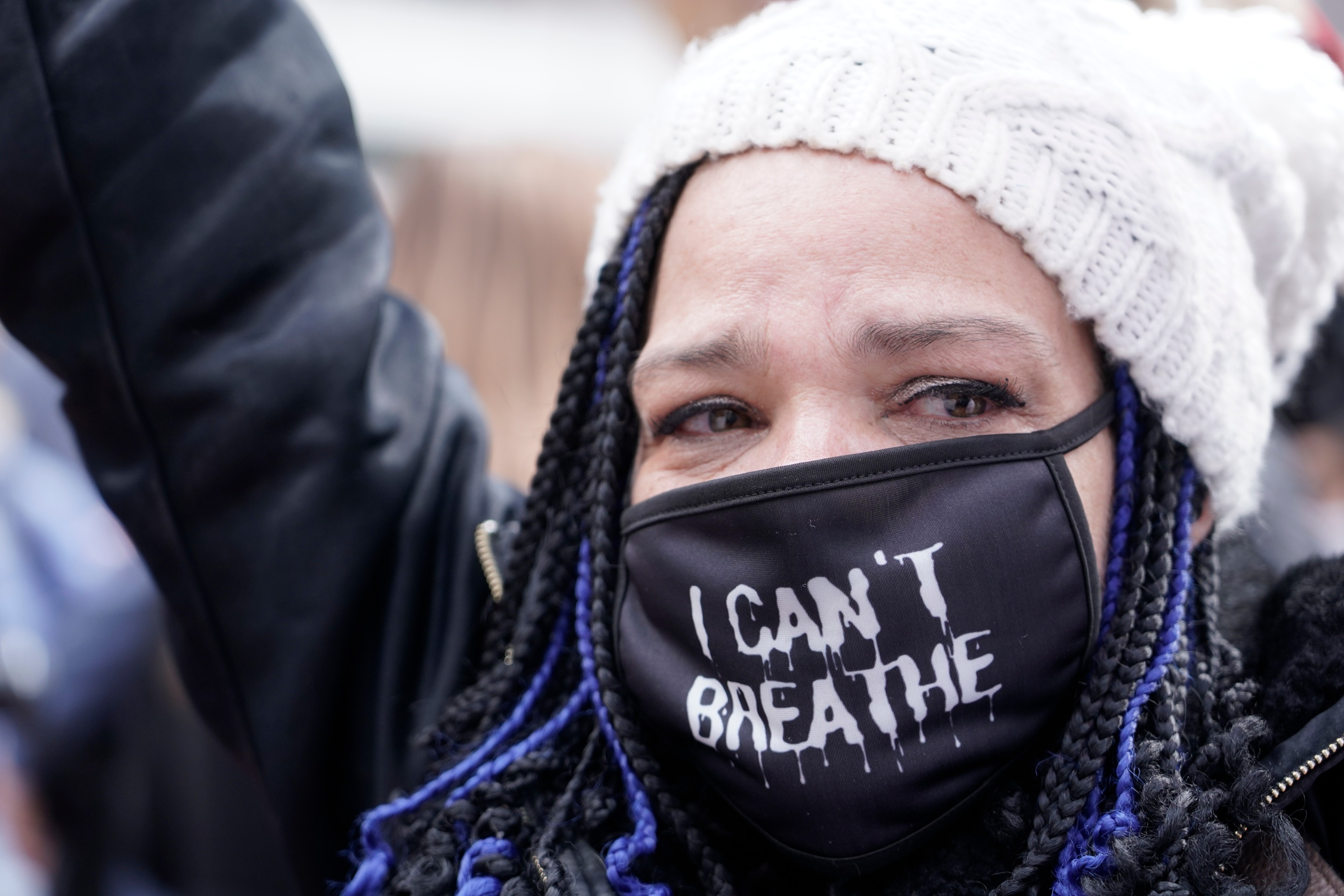 People cheer in Minneapolis after a guilty verdict was announced at the trial of former Minneapolis police Officer Derek Chauvin for the 2020 death of George Floyd on April 20, 2021. (Morry Gash / Associated Press)