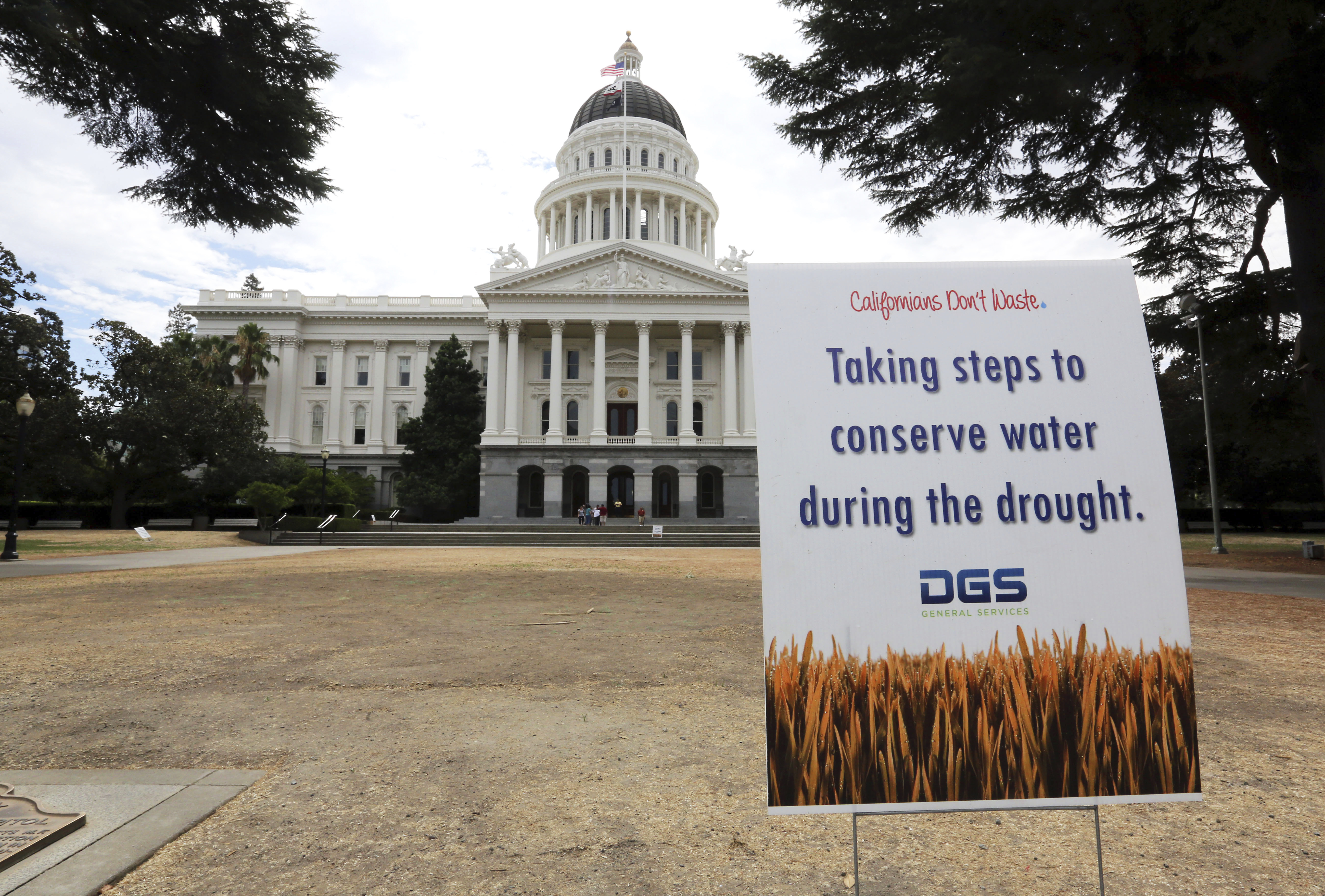 In this July 8, 2014, file photo, is a sign alerting visitors to water conservation efforts at the state Capitol in Sacramento. On April 21, 2021, Calif. Gov. Gavin Newsom declared an emergency executive order in two Northern California counties in response to drought conditions affecting much of the state. The announcement affects Mendocino and Sonoma counties, where Newsom said drought conditions are especially bad. (AP Photo/Rich Pedroncelli, File)