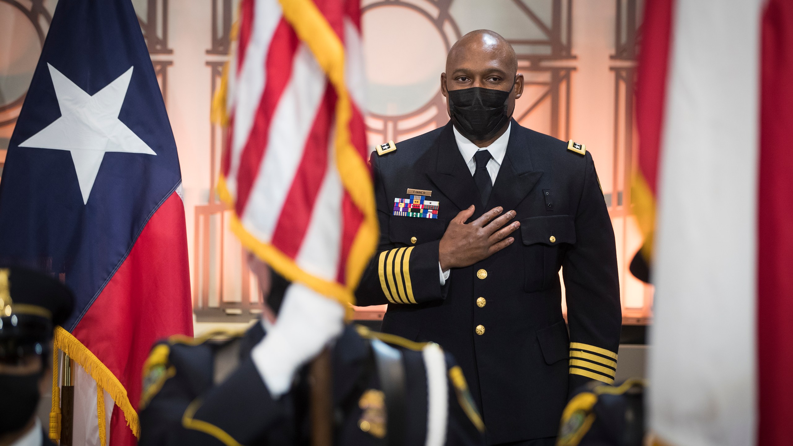 In this April 5, 2021, file photo, Houston Police Chief New Houston Police Chief Troy Finner stands for the national anthem before being sworn in as HPD's newest leader at City Hall in Houston. (Brett Coomer/Houston Chronicle via AP)