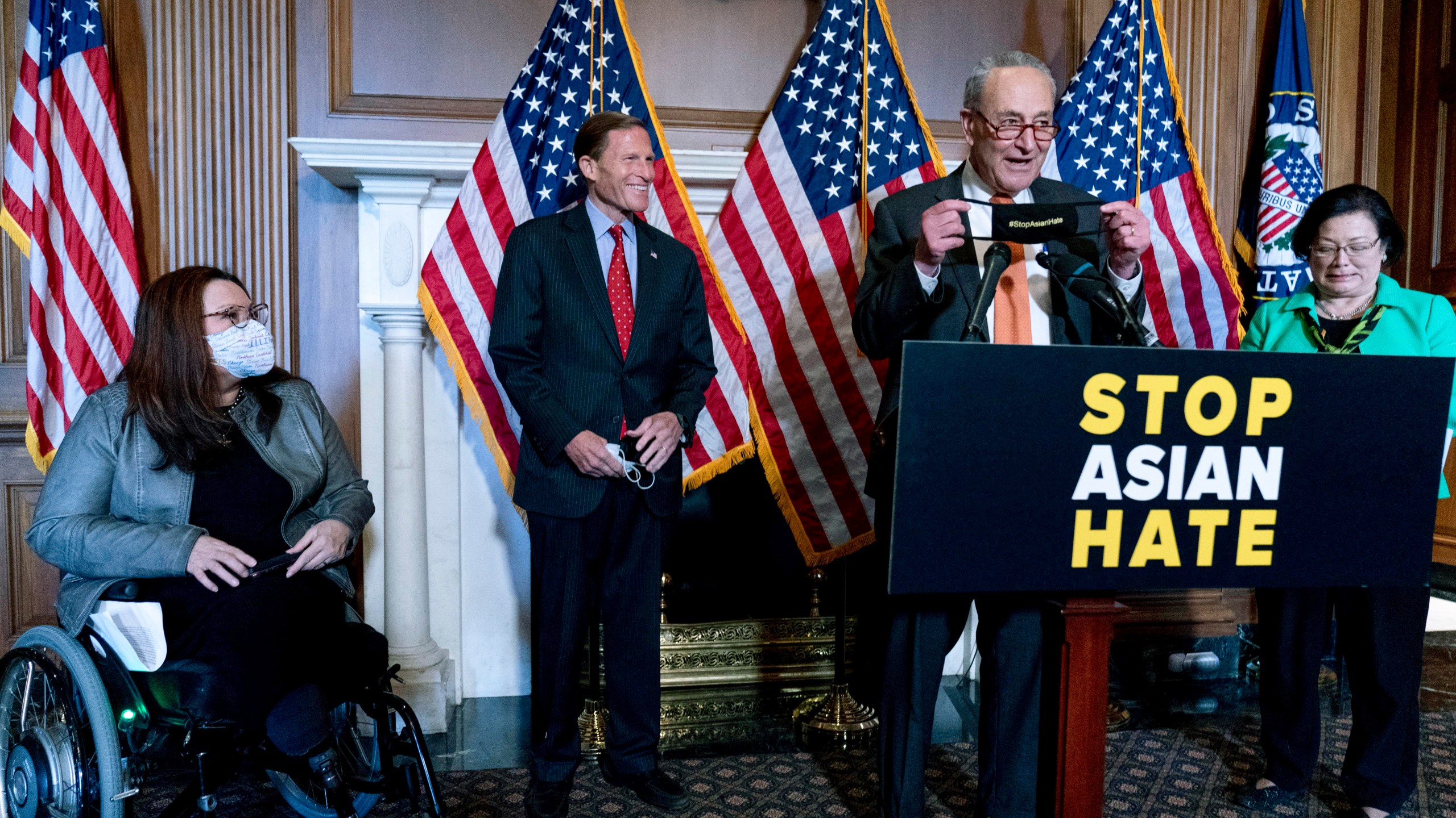 Senate Majority Leader Chuck Schumer of N.Y., accompanied by Sen. Mazie Hirono, D-Hawaii, Sen. Tammy Duckworth, D-Ill., and Sen. Richard Blumenthal, D-Conn., speaks at a news conference after the Senate passed a COVID-19 Hate Crimes Act on Capitol Hill, Thursday, April 22, 2021, in Washington. (AP Photo/Andrew Harnik)