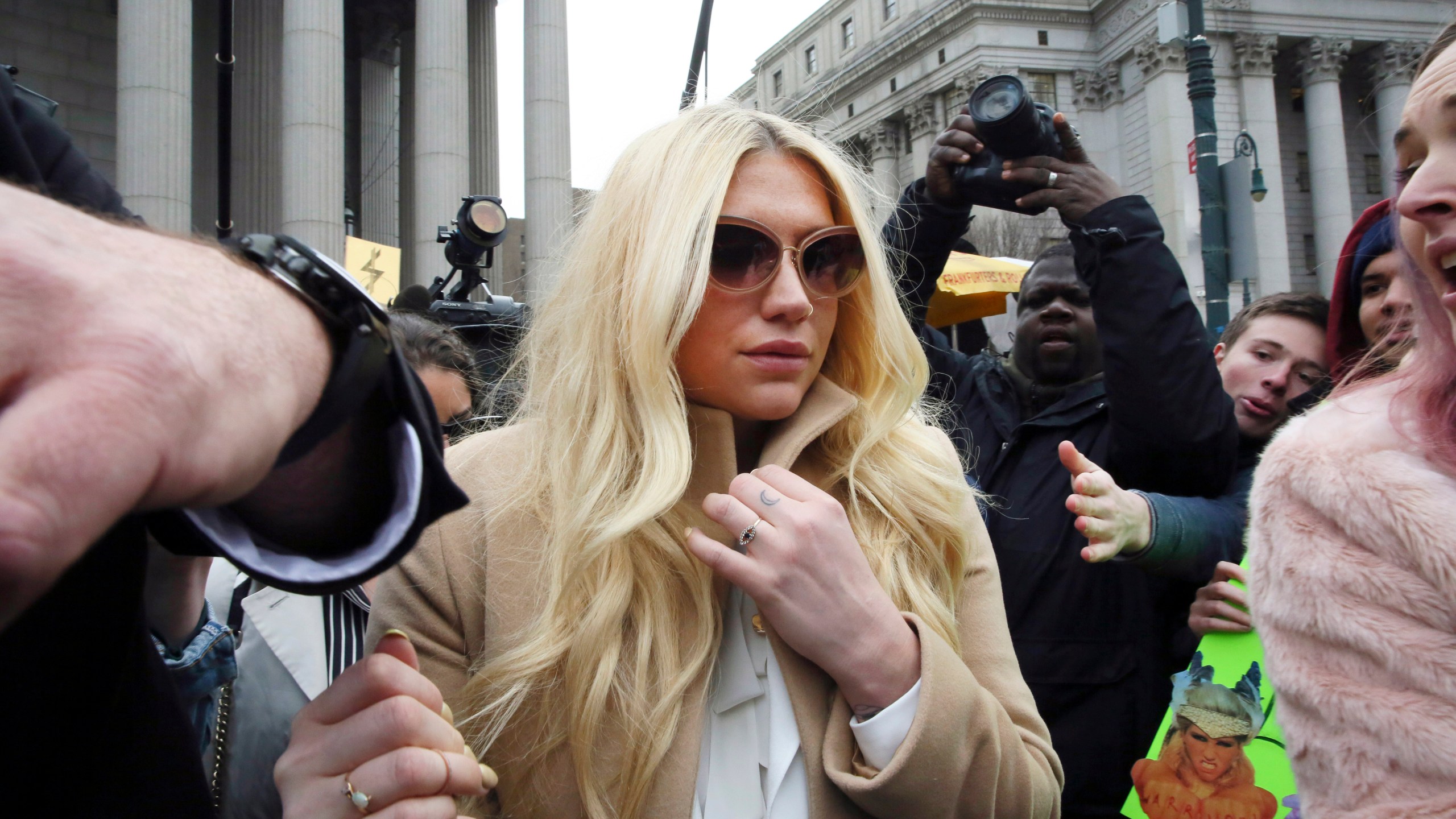 In this Feb. 19, 2016, file photo, pop star Kesha leaves Supreme court in New York after a hearing involving her producer, Dr. Luke. (AP Photo/Mary Altaffer, File)