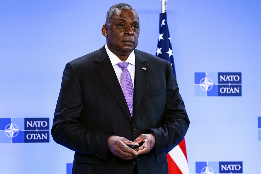 In this April 14, 2021, file photo, Secretary of Defense Lloyd Austin poses for photographers as he arrives at NATO headquarters in Brussels. The Associated Press has learned that a Pentagon panel is recommending that decisions to prosecute service members for sexual assault be made by independent authorities, not commanders. It would be a major reversal of military practice and a change long sought by Congress members. (Kenzo Tribouillard, Pool via AP)