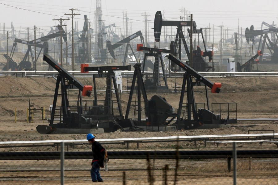 In this Jan. 16, 2015, file photo, pumpjacks are seen operating in Bakersfield, Calif. (AP Photo/Jae C. Hong, File)