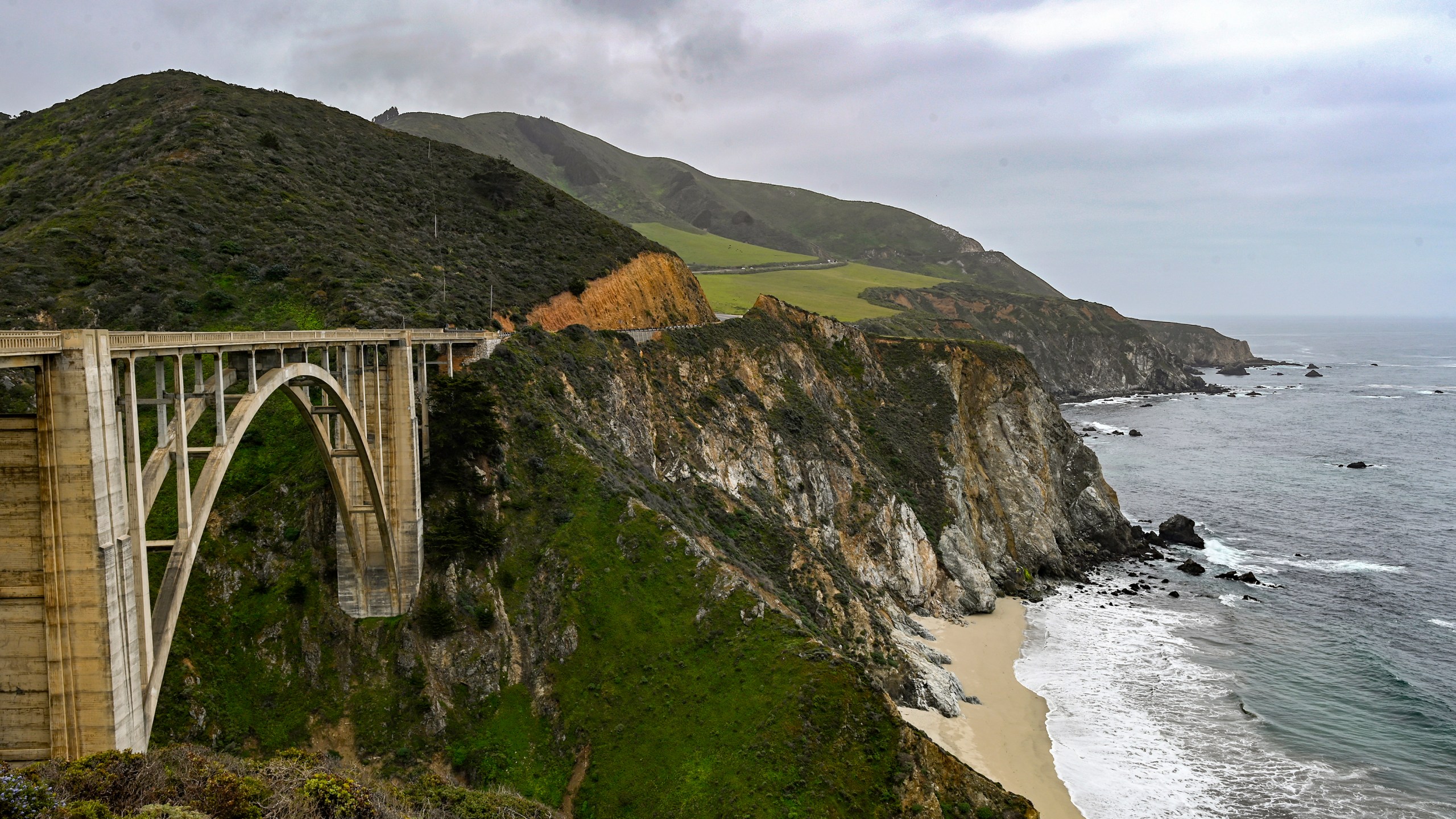 Bixby Bridge on Highway 1 near Big Sur, Calif., is seen on April 23, 2021. A section of California’s scenic Highway 1 that collapsed during a winter storm in January 2021 has reopened to traffic. (AP Photo/Nic Coury)