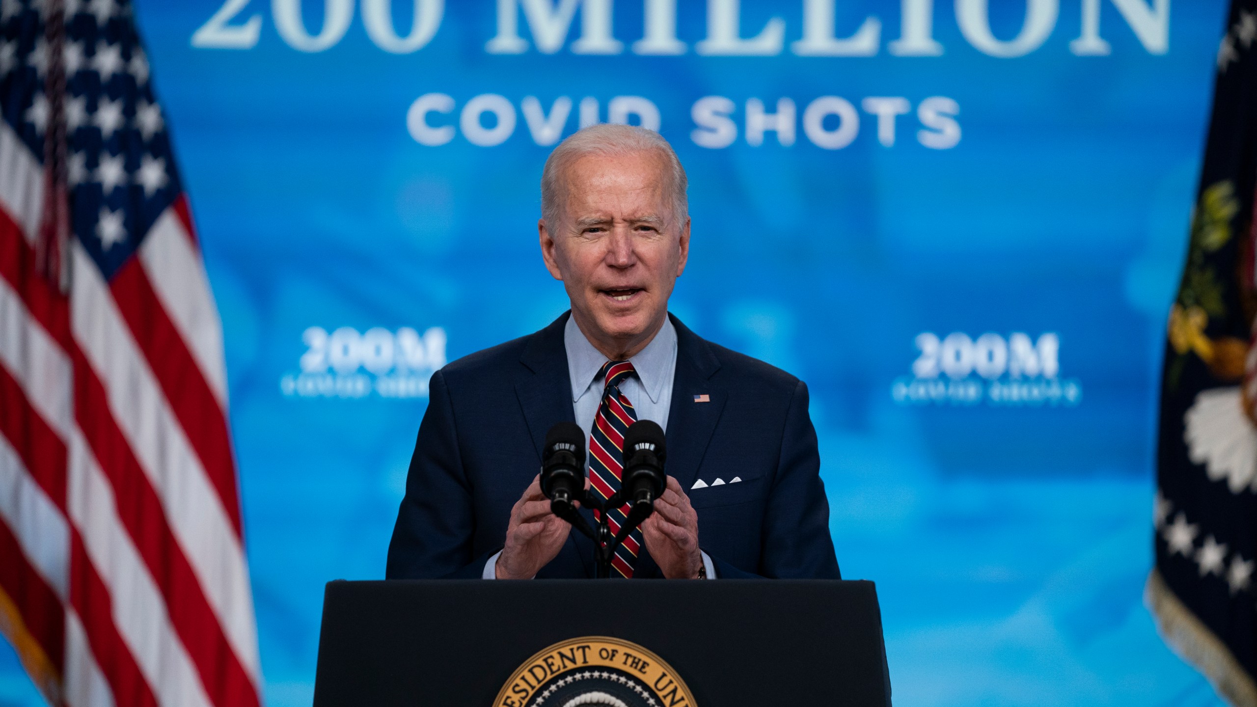 In this April 21, 2021, file photo, President Joe Biden speaks about COVID-19 vaccinations at the White House, in Washington. Biden has touted administering 200 million doses of COVID-19 vaccine before his first 100 days in office and signaled it is time for the U.S. to begin sharing its surplus. (AP Photo/Evan Vucci, File)