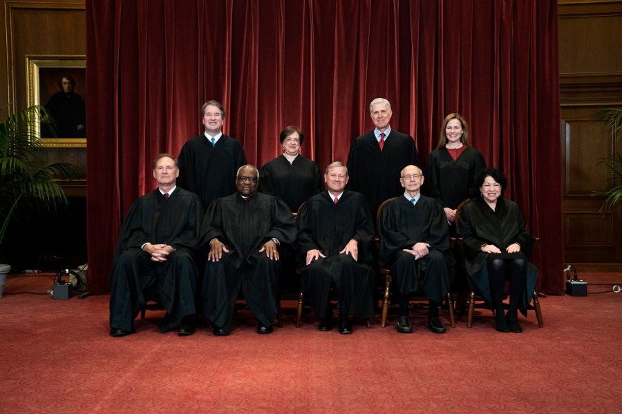 In this April 23, 2021, file photo members of the Supreme Court pose for a group photo at the Supreme Court in Washington. (Erin Schaff/The New York Times via AP, Pool, File)