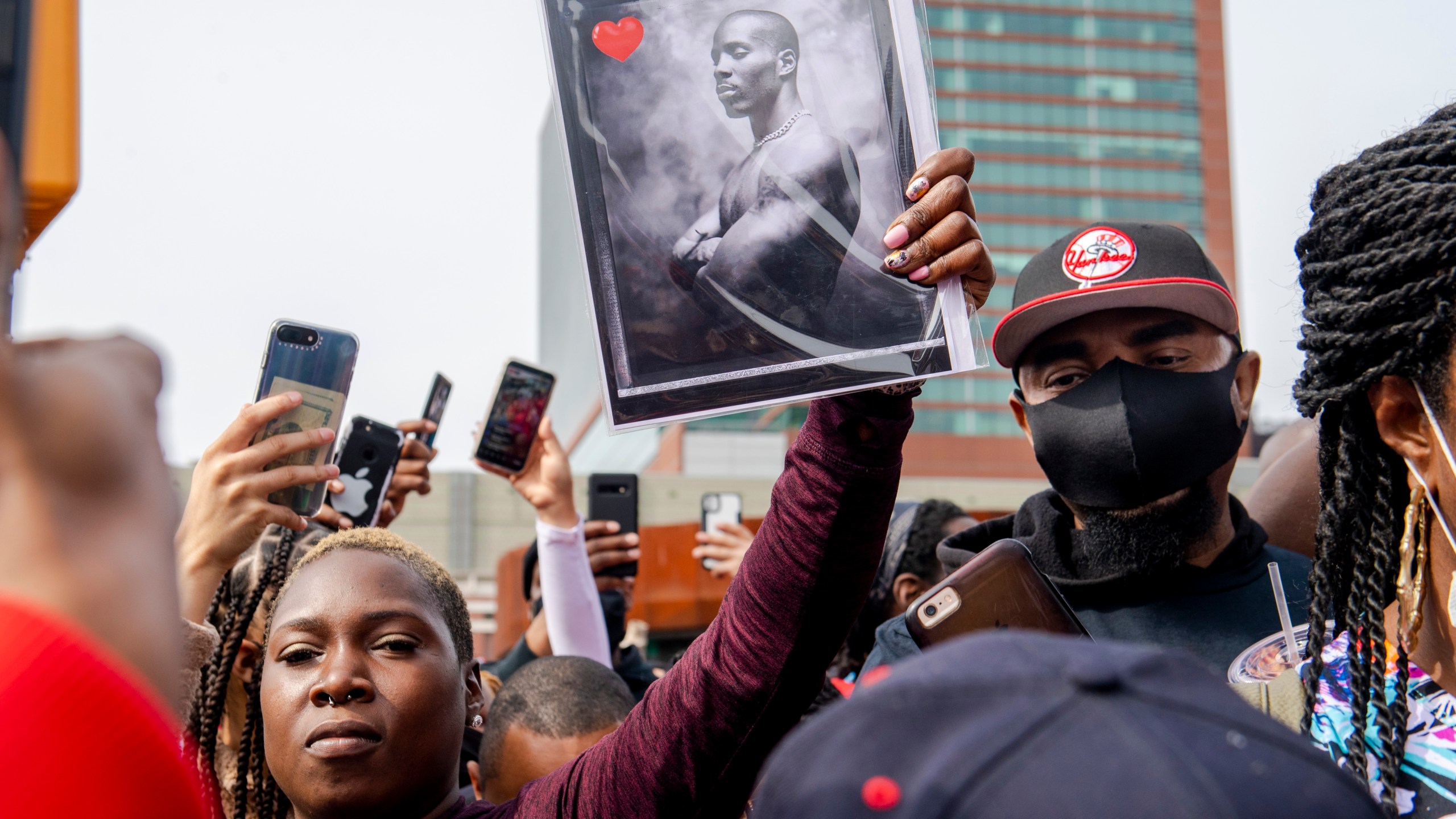 People gather for a "Celebration of Life Memorial" for rapper DMX at Barclays Center, Saturday, April. 24, 2021, in the Brooklyn borough of New York.(AP Photo/Brittainy Newman)