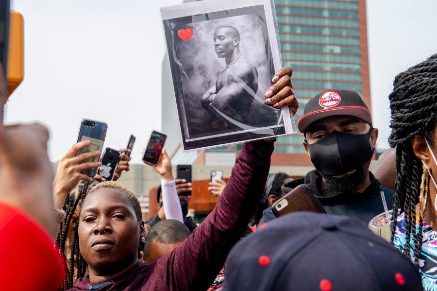 People gather for a "Celebration of Life Memorial" for rapper DMX at Barclays Center, Saturday, April. 24, 2021, in the Brooklyn borough of New York.(AP Photo/Brittainy Newman)