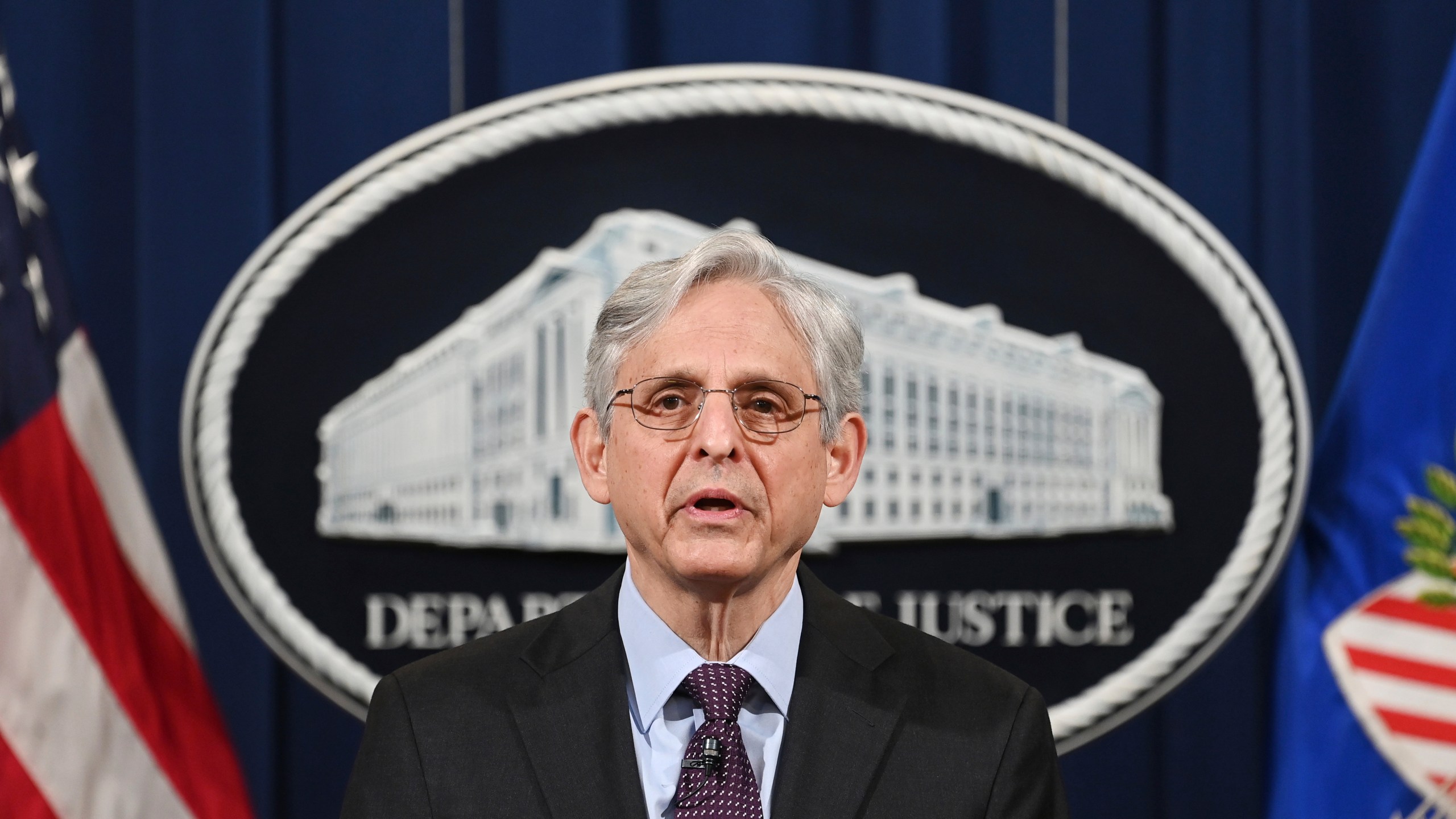 Attorney General Merrick Garland speaks at the Department of Justice in Washington on April 26, 2021. The Justice Department is opening a sweeping probe into policing in Louisville after the March 2020 death of Breonna Taylor, who was shot to death by police during a raid at her home. (Mandel Ngan/Pool via AP)