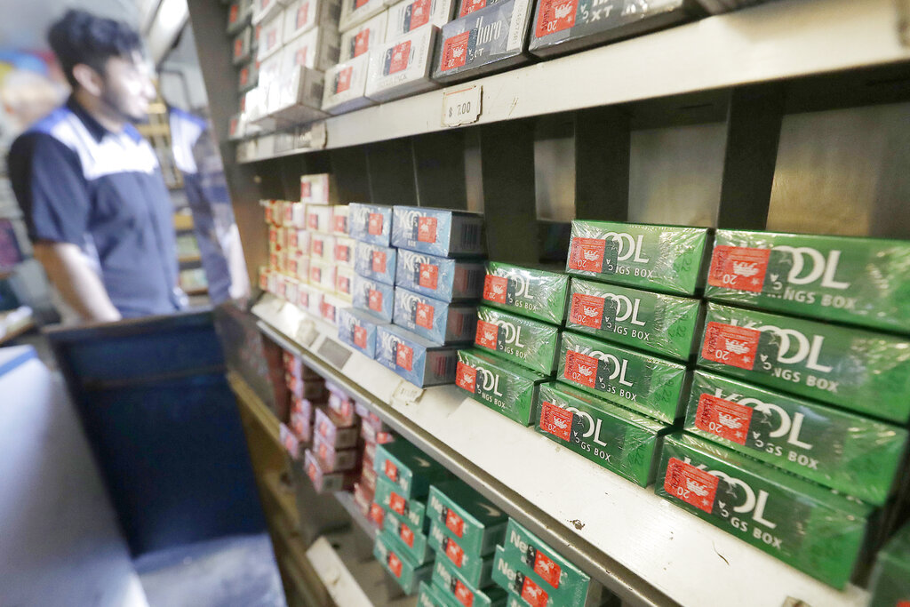 This May 17, 2018 file photo shows packs of menthol cigarettes and other tobacco products at a store in San Francisco. (AP Photo/Jeff Chiu, File)