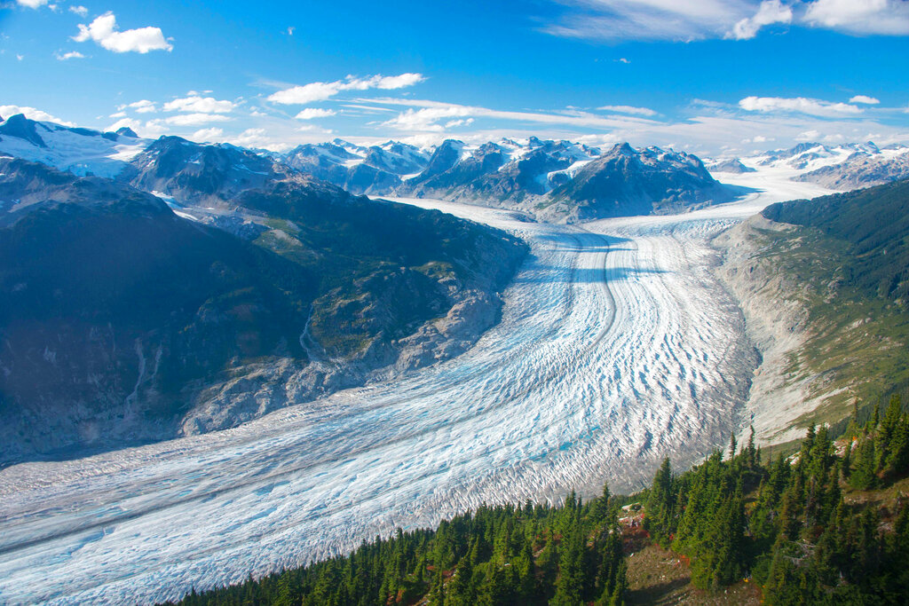 This September 2017 photo provided by researcher Brian Menounos shows the Klinaklini glacier in British Columbia, Canada. The glacier and the adjacent icefield lost about 15 gigatons of water from 2000-2019, Menounos says. (Brian Menounos via AP)