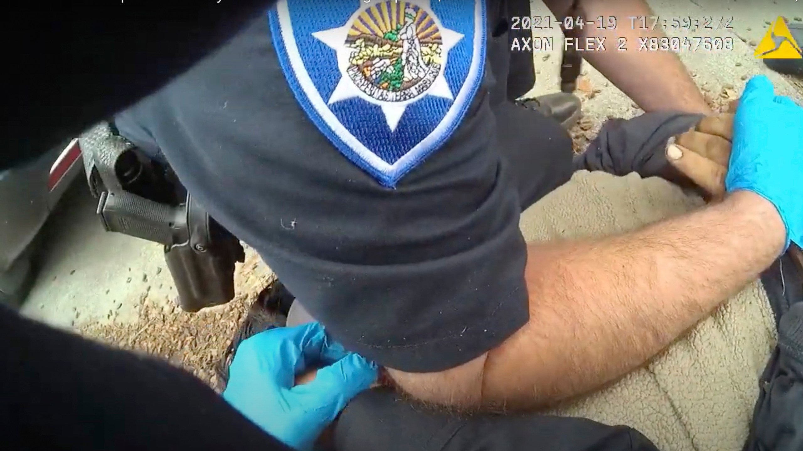 In this image taken from Alameda Police Department body camera video, Alameda Police Department officers pin 26-year-old Mario Gonzalez to the ground during an arrest, April 19, 2021, in Alameda, Calif. Gonzalez stopped breathing during the arrest and was pronounced dead at a hospital. (Alameda Police Department via AP)