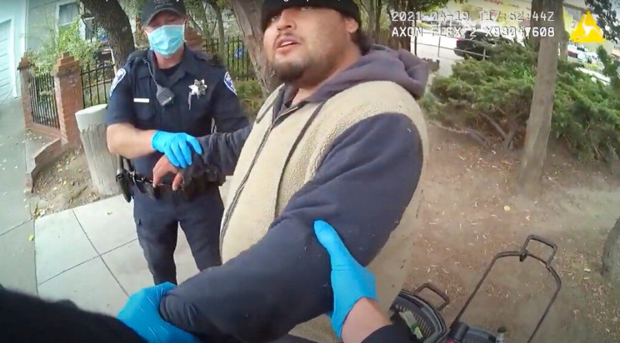 In this image taken from Alameda Police Department body camera video, Alameda Police Department officers attempt to take 26-year-old Mario Gonzalez into custody, April 19, 2021, in Alameda, Calif. (Alameda Police Department via AP)