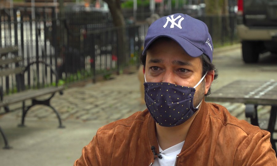 Ankur Chandra, 38, talks about his father's experience with COVID-19, during an interview Tuesday, April 27, 2021, in New York. (AP Photo/David Martin)