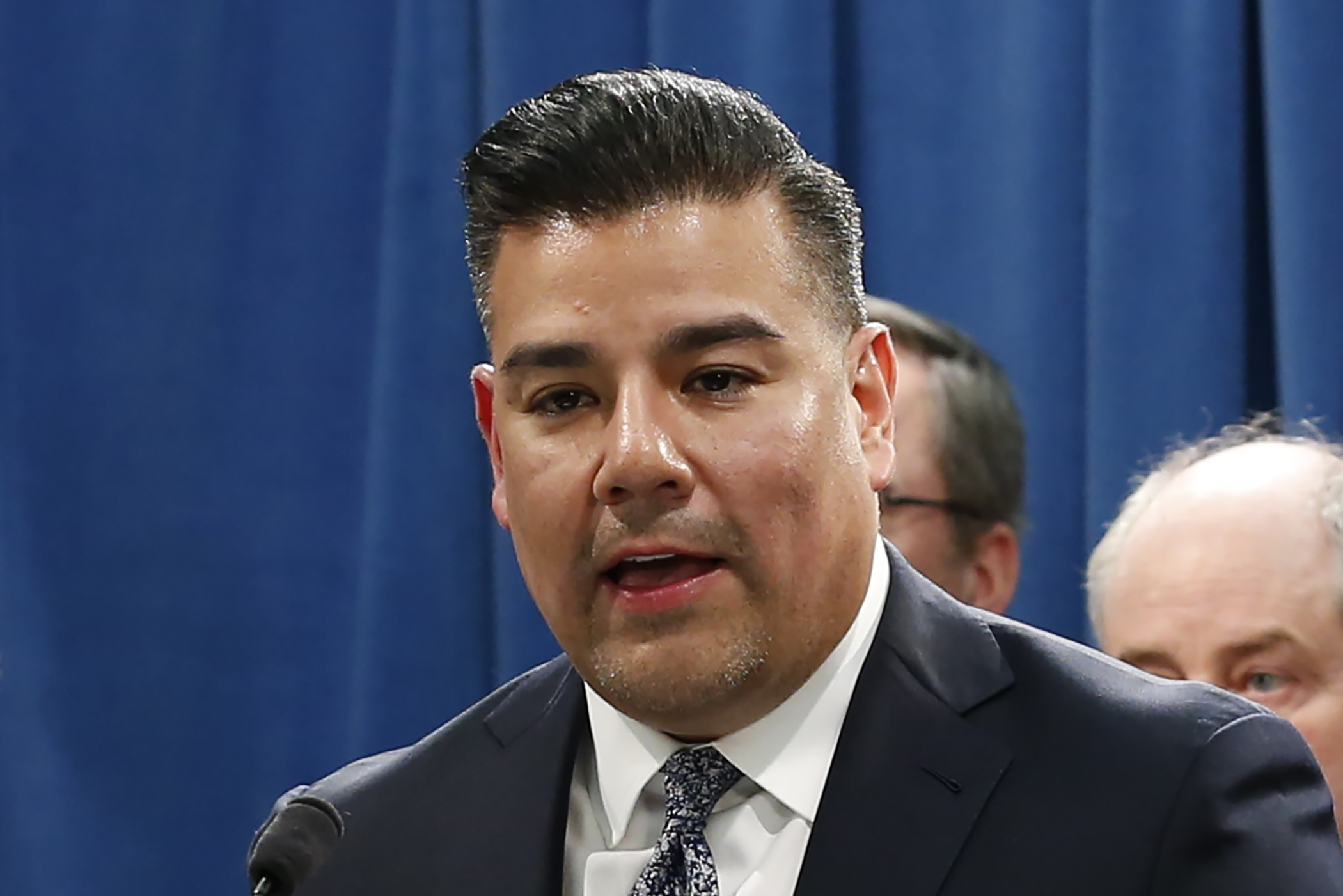 In this Feb. 18, 2020, file photo, California Insurance Commissioner Ricardo Lara speaks at a state Capitol news conference in Sacramento, Calif. A bill moving through the California Legislature would let adults add their aging parents as dependents on their health insurance. Supporters, including Insurance Commissioner Ricardo Lara, say it will save families money by, among other things, limiting their expenses to one shared out-of-pocket maximum limit. "When we were young, our parents were there for us and took care of us," Lara said. "Now we can take care of them when they need it the most." (AP Photo/Rich Pedroncelli, File)