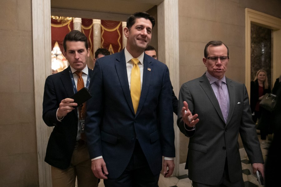 In this Dec. 20, 2018 file photo House Speaker Paul Ryan leaves the chamber after the Republican-led House approved funding for President Donald Trump's border wall at the Capitol in Washington. Ryan thinks his divided party, and history, will move on since the chaotic end of Donald Trump's presidency. The either-or debate over fealty to Trump "is going to fade," the 2012 Republican vice presidential candidate said in an interview. "I think circumstances, ideas and new candidates are going to overshadow that whole conversation." (AP Photo/J. Scott Applewhite,File)