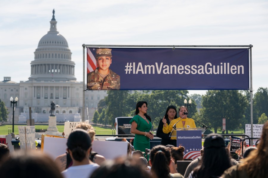 In this July 30, 2020, file photo slain Army Spc. Vanessa Guillen's mother Gloria Guillen, right, joined by Vanessa's sister Lupe Guillen, center, and family attorney Natalie Khawam, speaks as she cries during a news conference on the National Mall in front of Capitol Hill in Washington. (AP Photo/Carolyn Kaster, File)