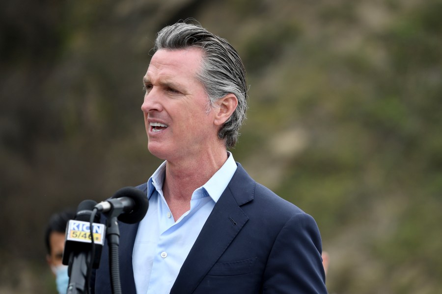 In this April 23, 2021, file photo, California Gov. Gavin Newsom speaks during a press conference in Big Sur, Calif. California on Saturday is increasing early release credits for tens of thousands of inmates including violent and repeat felons as it further trims the population of what once was the nation's largest state correctional system. Officials announced in mid-April that they will close a second prison as a result of the dwindling population, fulfilling a promise by Newsom. (AP Photo/Nic Coury, File)