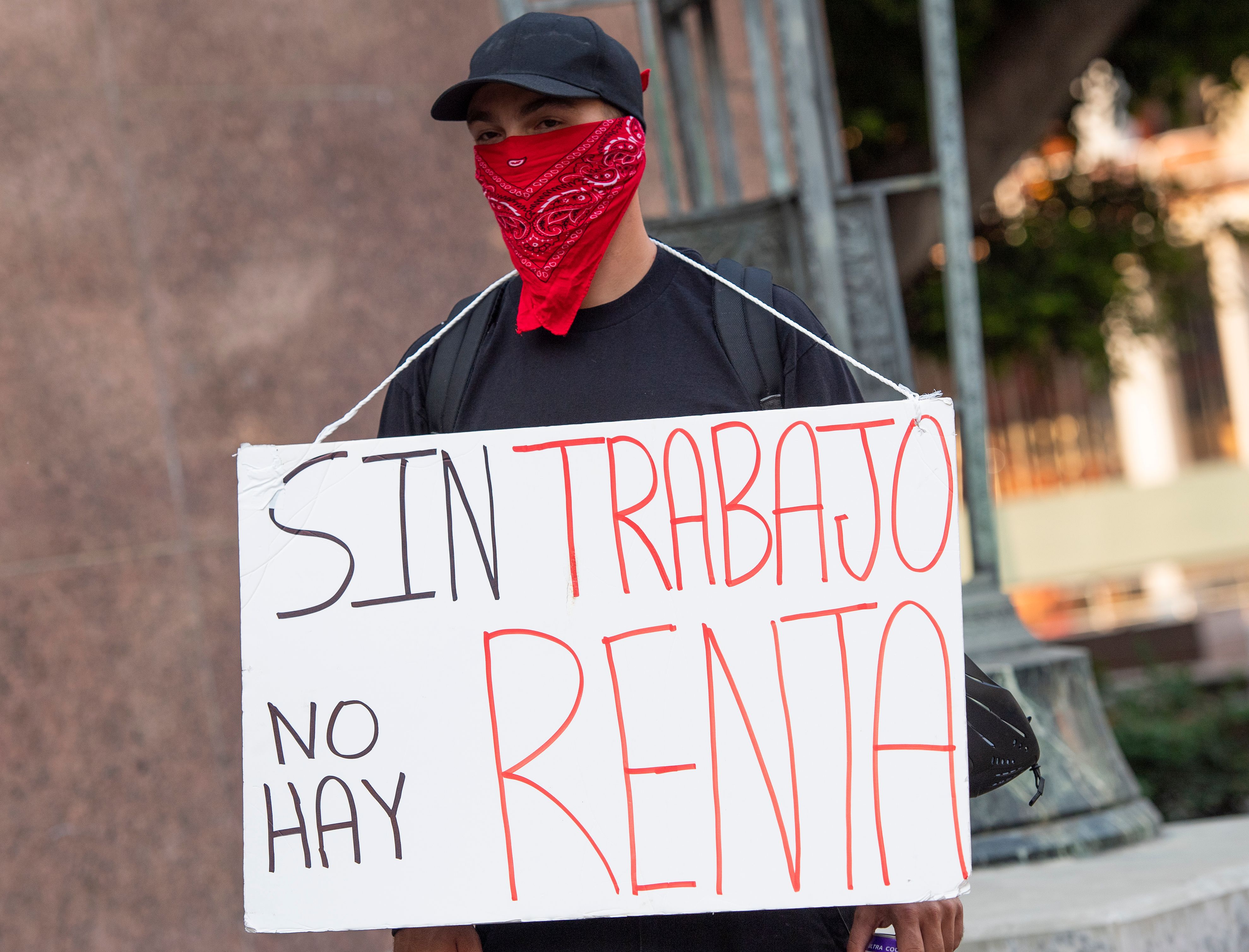 Renters and housing advocates attend a protest to cancel rent and avoid evictions amid Coronavirus pandemic on August 21, 2020, in Los Angeles, California. (VALERIE MACON/AFP via Getty Images)