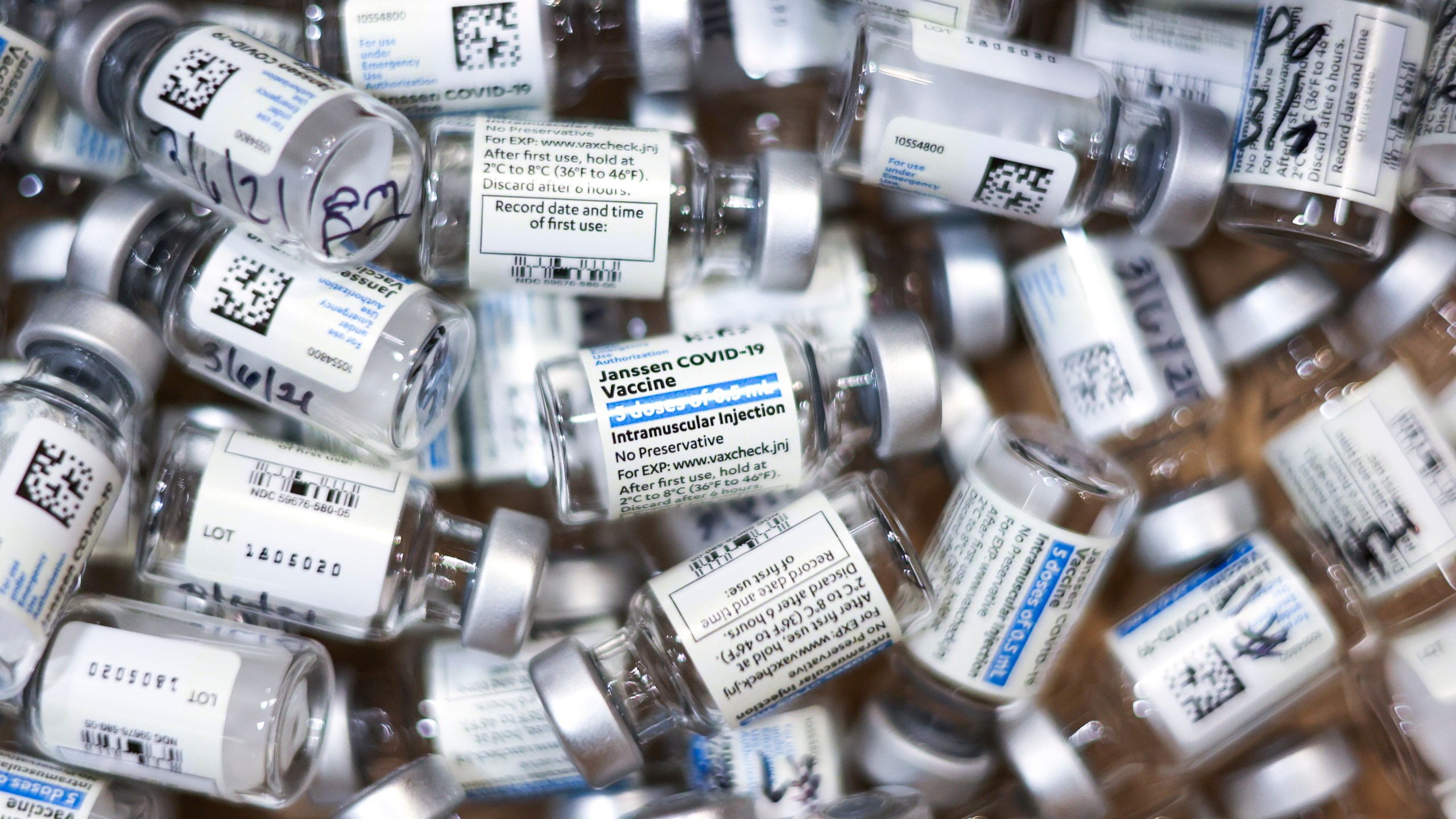 Used vials of the Johnson & Johnson COVID-19 vaccine sit in a box at an event put on by the Thornton Fire Department on March 6, 2021 in Thornton, Colorado. (Michael Ciaglo/Getty Images)