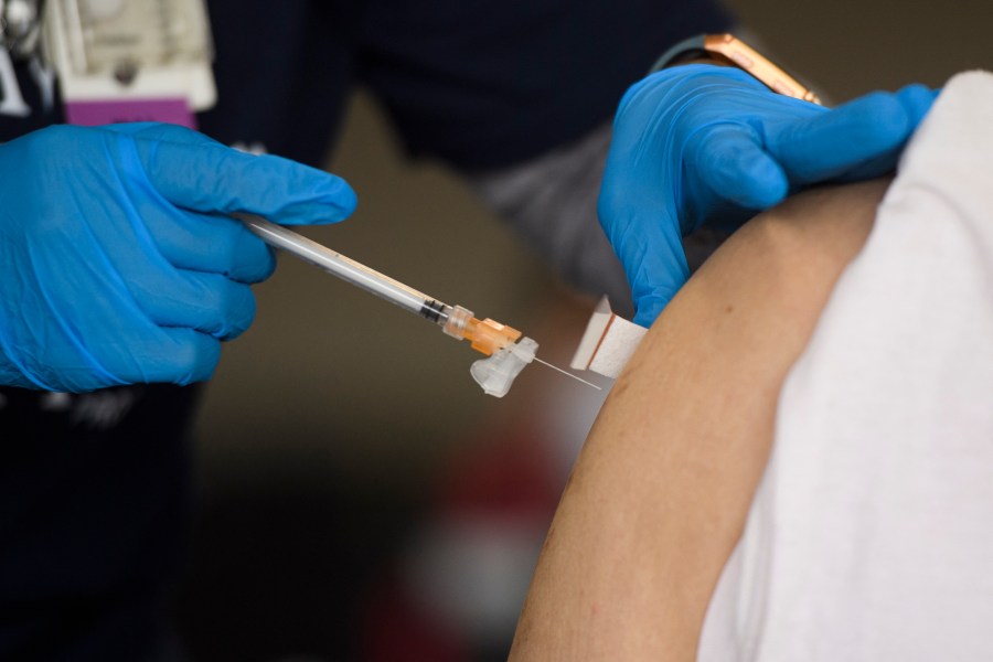 A registered nurse administers a dose of the Moderna COVID-19 vaccine at a pop-up vaccination site at the Dae Hueng Presbyterian Church in Gardena on April 17, 2021. (Patrick T. Fallon / AFP / Getty Images)