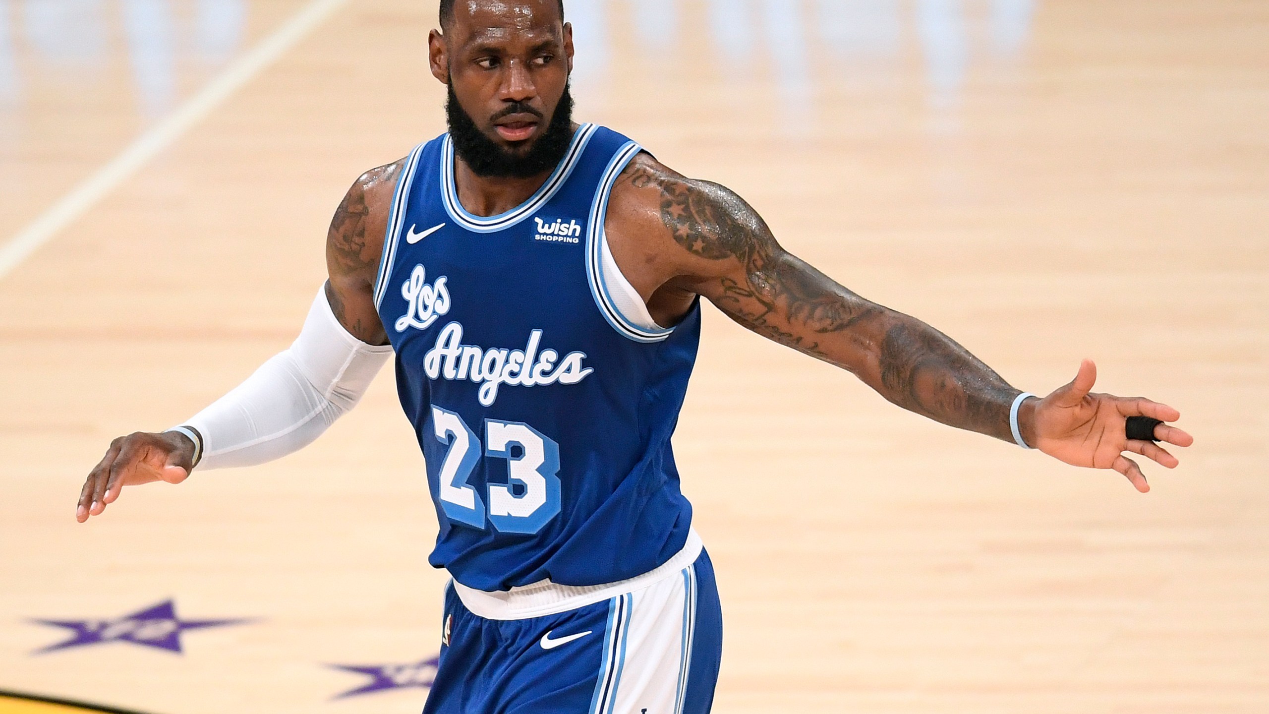 LeBron James #23 of the Los Angeles Lakers reacts to a basket during a 137-121 Lakers win over the Minnesota Timberwolves at Staples Center on March 16, 2021. (Harry How/Getty Images)