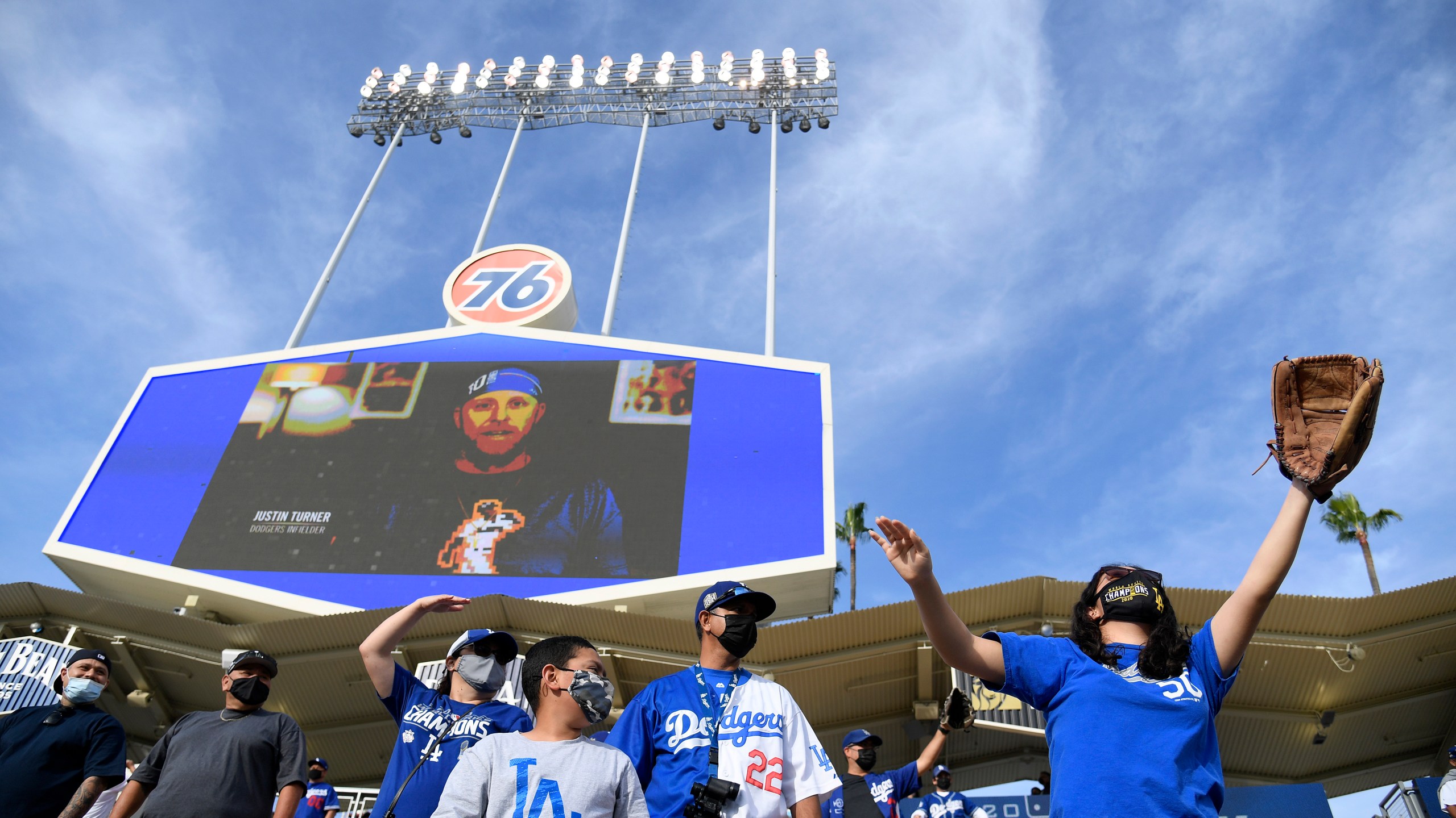 Fans watch home runs at batting practice before the game between the Washington Nationals and Los Angeles Dodgers at Dodger Stadium on April 10, 2021, in Los Angeles, California. (Harry How/Getty Images)