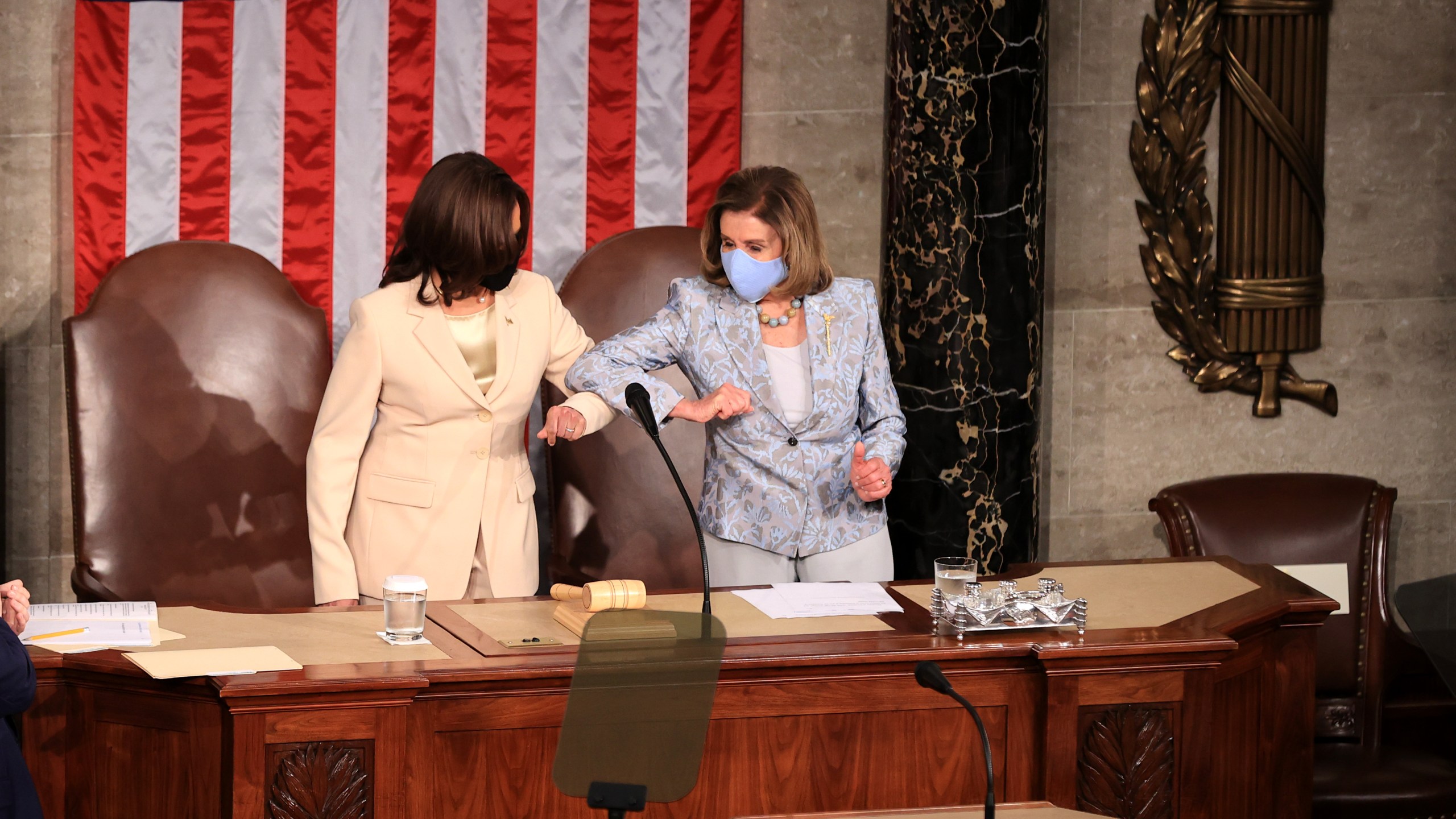 Vice President Kamala Harris and Speaker of the House Nancy Pelosi (D-CA) greet each other before U.S. President Joe Biden addresses a joint session of congress in the House chamber of the U.S. Capitol on April 28, 2021, in Washington, DC. (Chip Somodevilla/Getty Images)