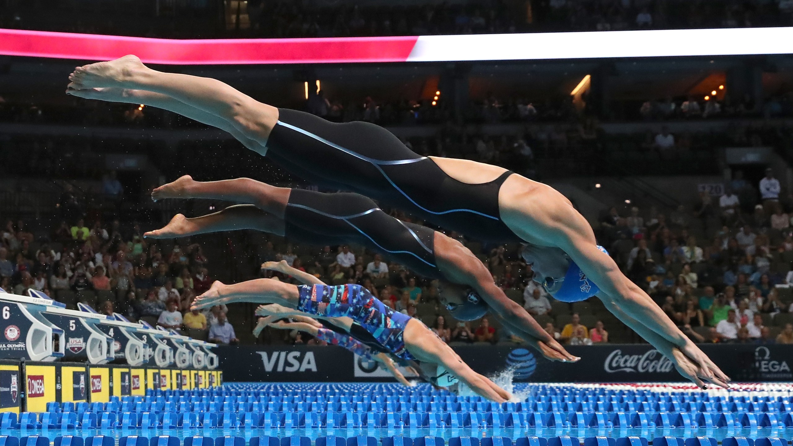 Amanda Weir, Lia Neal, Katrina Konopka, Madison Kennedy and Abbey Weitzeil of the United States dive in to compete in the final heat for the Women's 50 Meter Freestyle during Day Eight of the 2016 U.S. Olympic Team Swimming Trials at CenturyLink Center on July 3, 2016 in Omaha, Nebraska. (Tom Pennington/Getty Images)