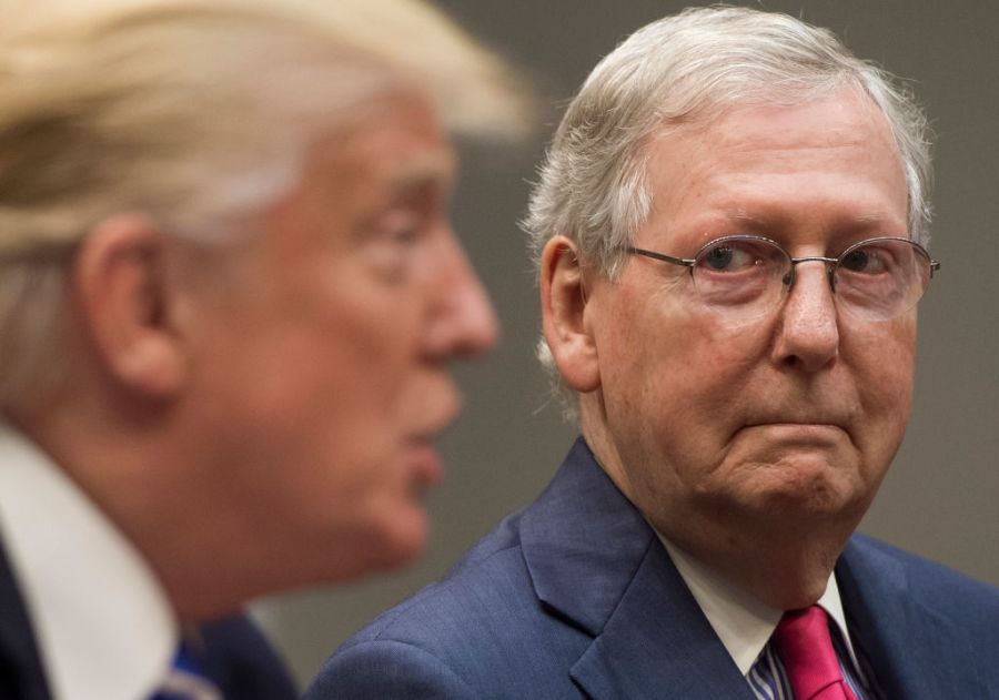 President Trump speaks alongside Senate Majority Leader Mitch McConnell, as they hold a meeting about tax reform in the Roosevelt Room of the White House in 2017. (SAUL LOEB/AFP via Getty Images)