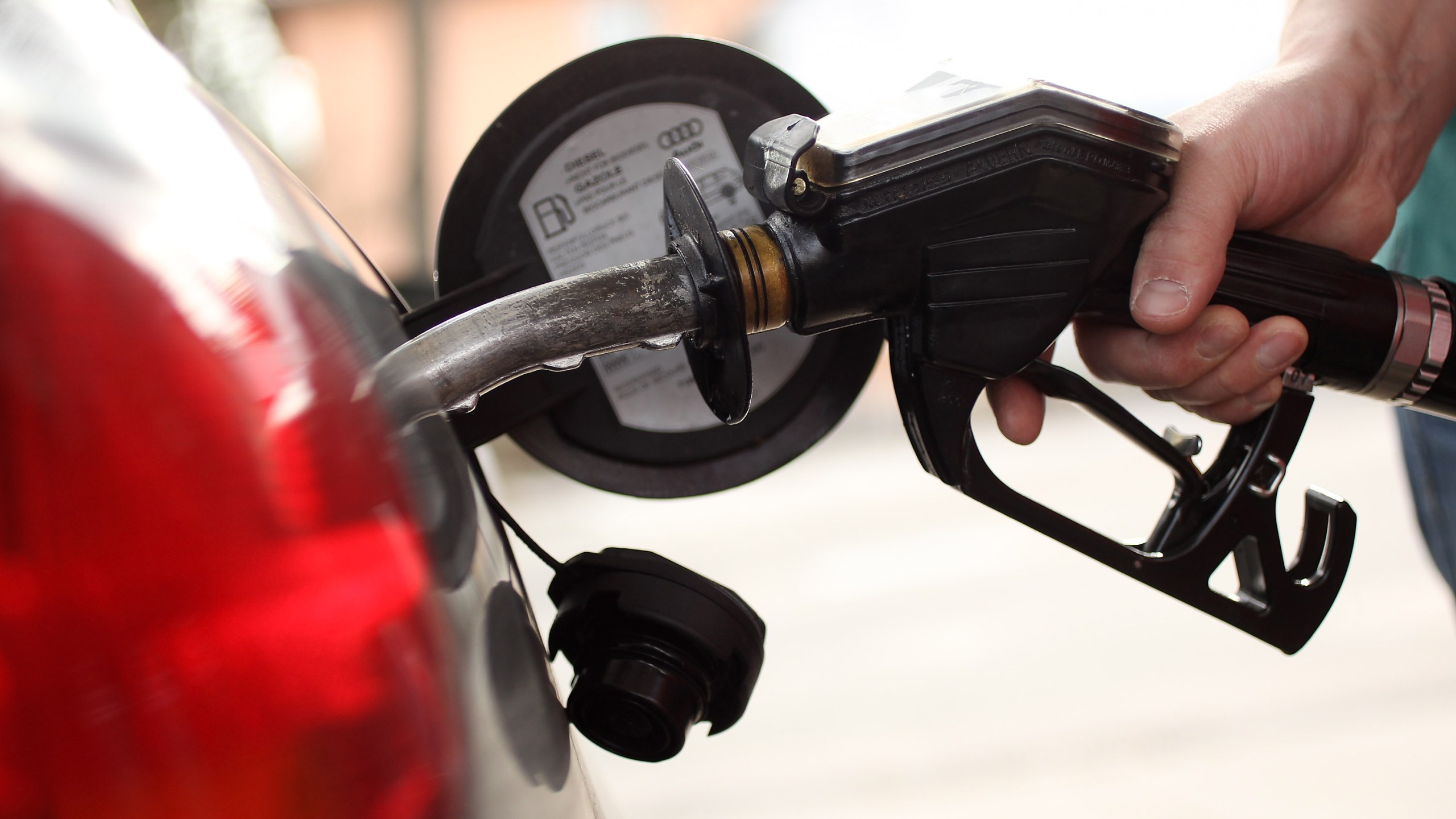 A gasoline station attendant pumps diesel into a car at a filling station on March 23, 2010 in Berlin, Germany. (Photo Illustration by Sean Gallup/Getty Images)