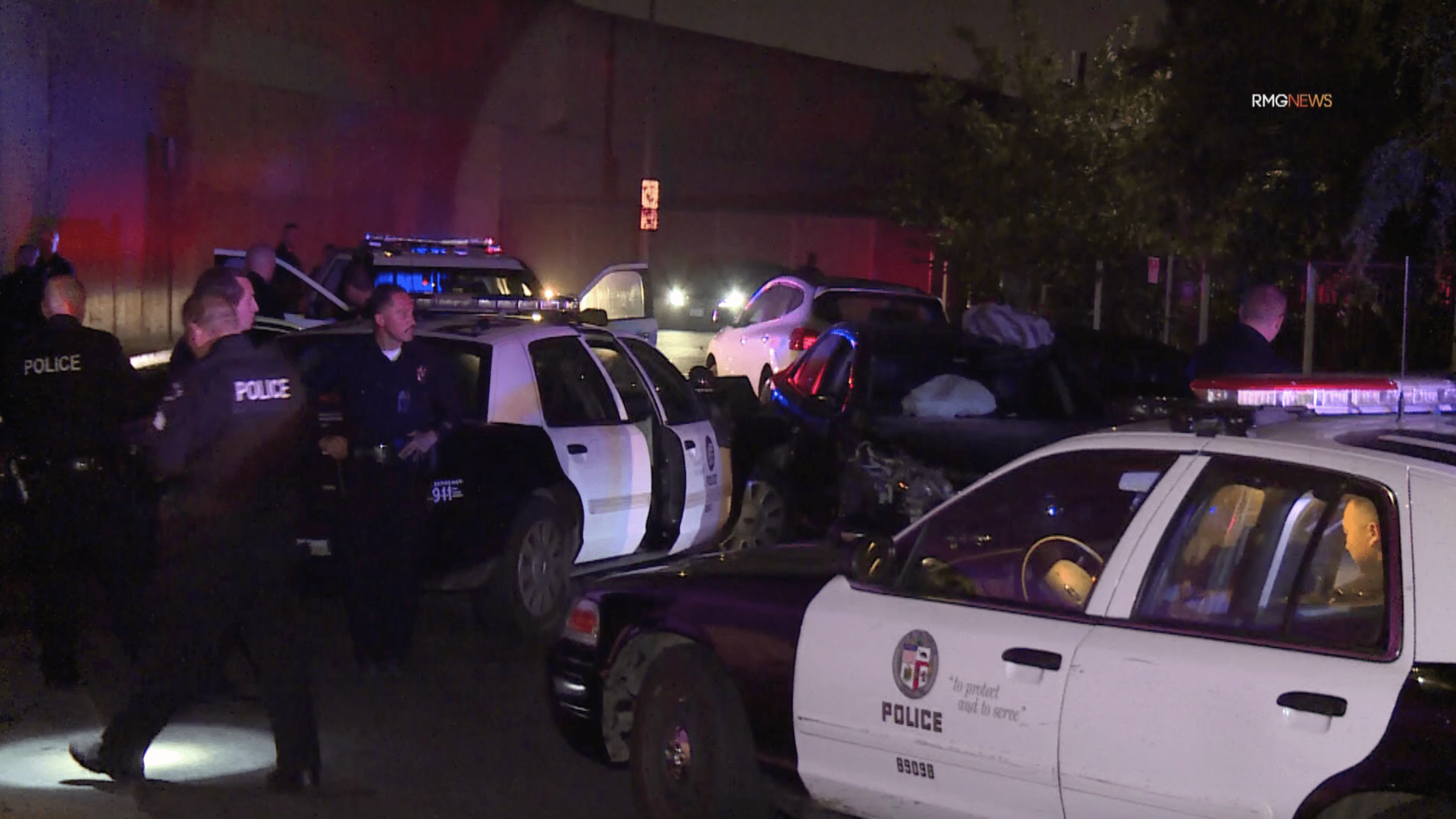 Police respond to the scene of a crash following a pursuit in the area of 64th Street and Budlong Avenue in South L.A. April 10, 2021. (RMG News)