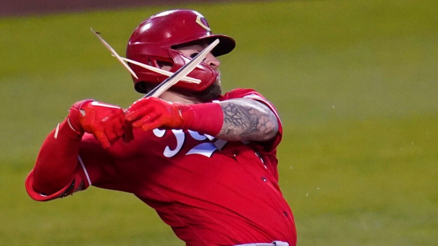 Cincinnati Reds Tucker Barnhart (16) breaks a bat as he grounds out during the second inning of a baseball game against the Los Angeles Dodgers Tuesday, April 27, 2021, in Los Angeles. (AP Photo/Ashley Landis)