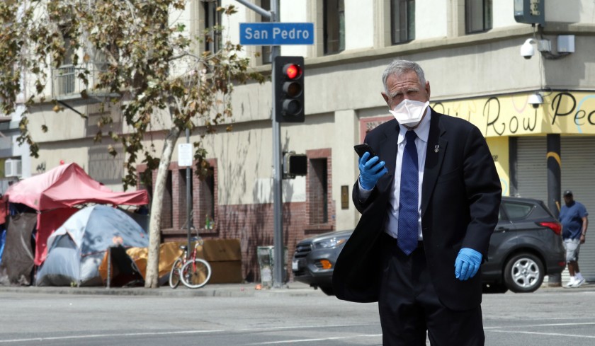 U.S. District Judge David O. Carter tours skid row in April 2020.(Myung J. Chun/Los Angeles Times)