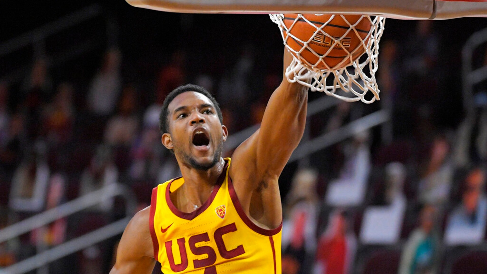 In this Feb. 17, 2021, file photo, Southern California forward Evan Mobley dunks during the second half of an NCAA college basketball game against Arizona State in Los Angeles. (AP Photo/Mark J. Terrill, File)