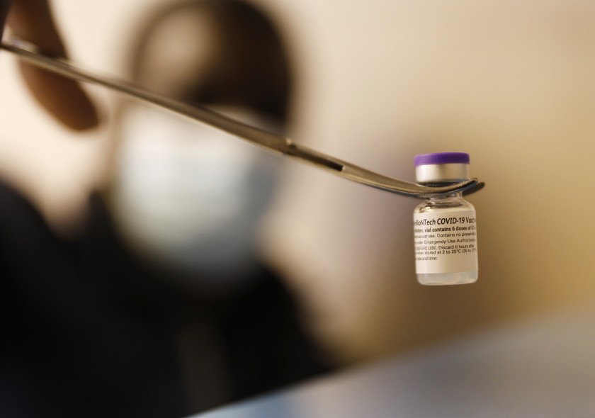 A vial of the Pfizer COVID-19 vaccine that contains roughly six doses is shown in an undated photo. (Al Seib/Los Angeles Times)