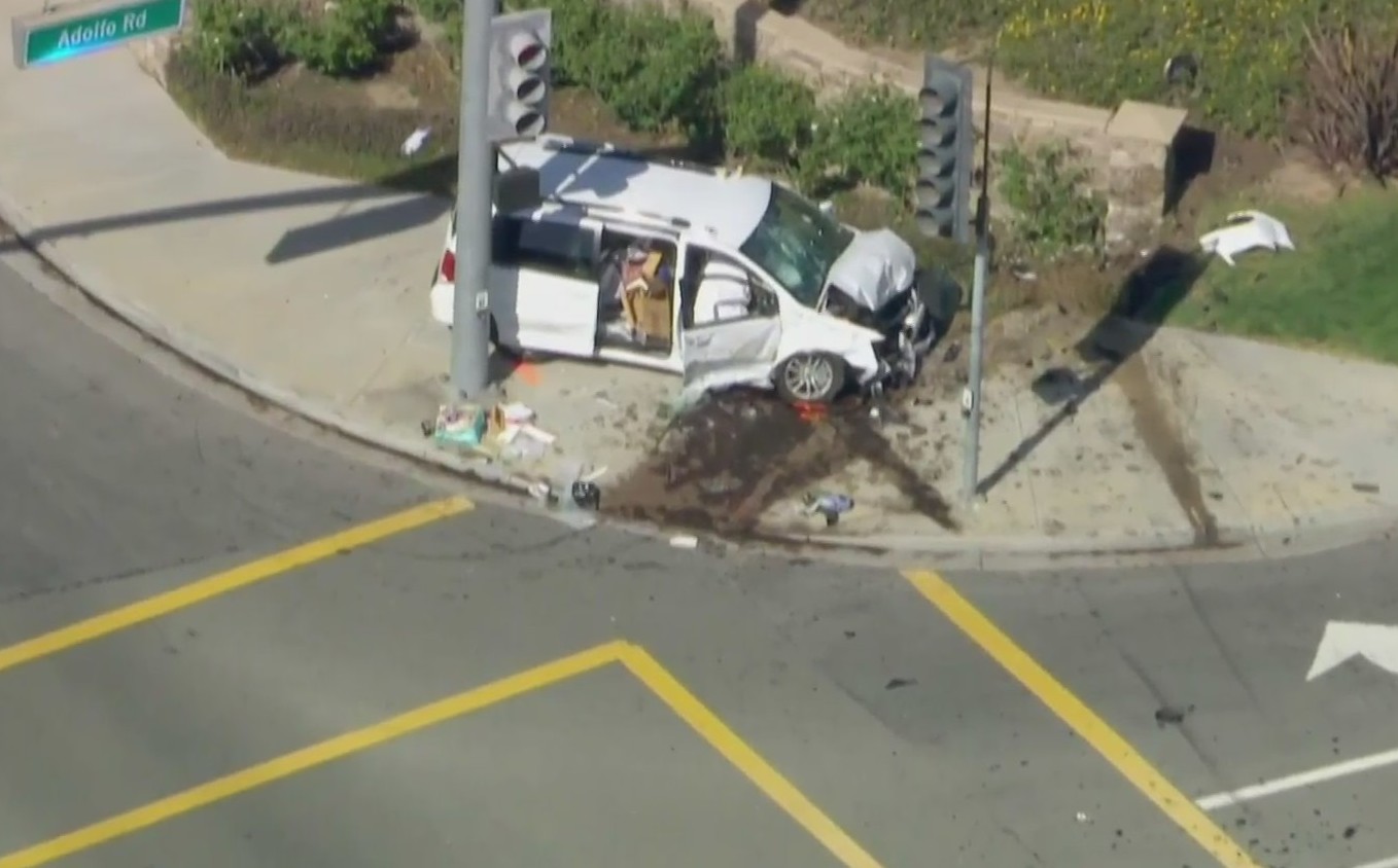 A minivan ended up on a sidewalk after a crash in Camarillo on April 16, 2021. (KTLA)