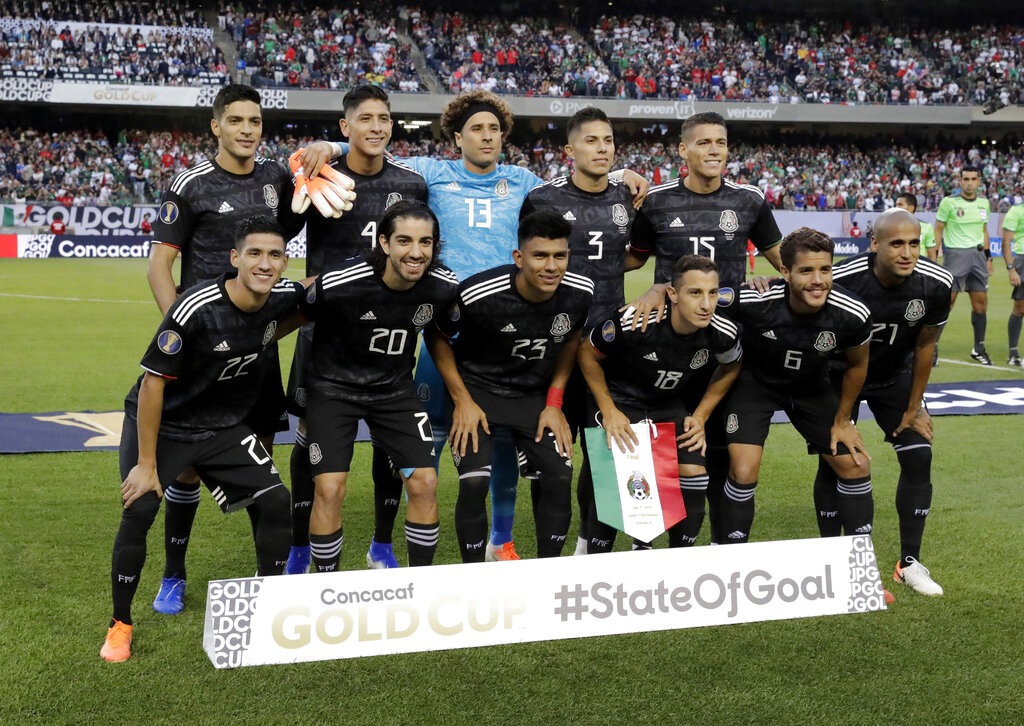 Mexico's team pose for a photo before their CONCACAF Gold Cup final match against the United States in Chicago, Sunday, July 7, 2019. (AP Photo/Nam Y. Huh)